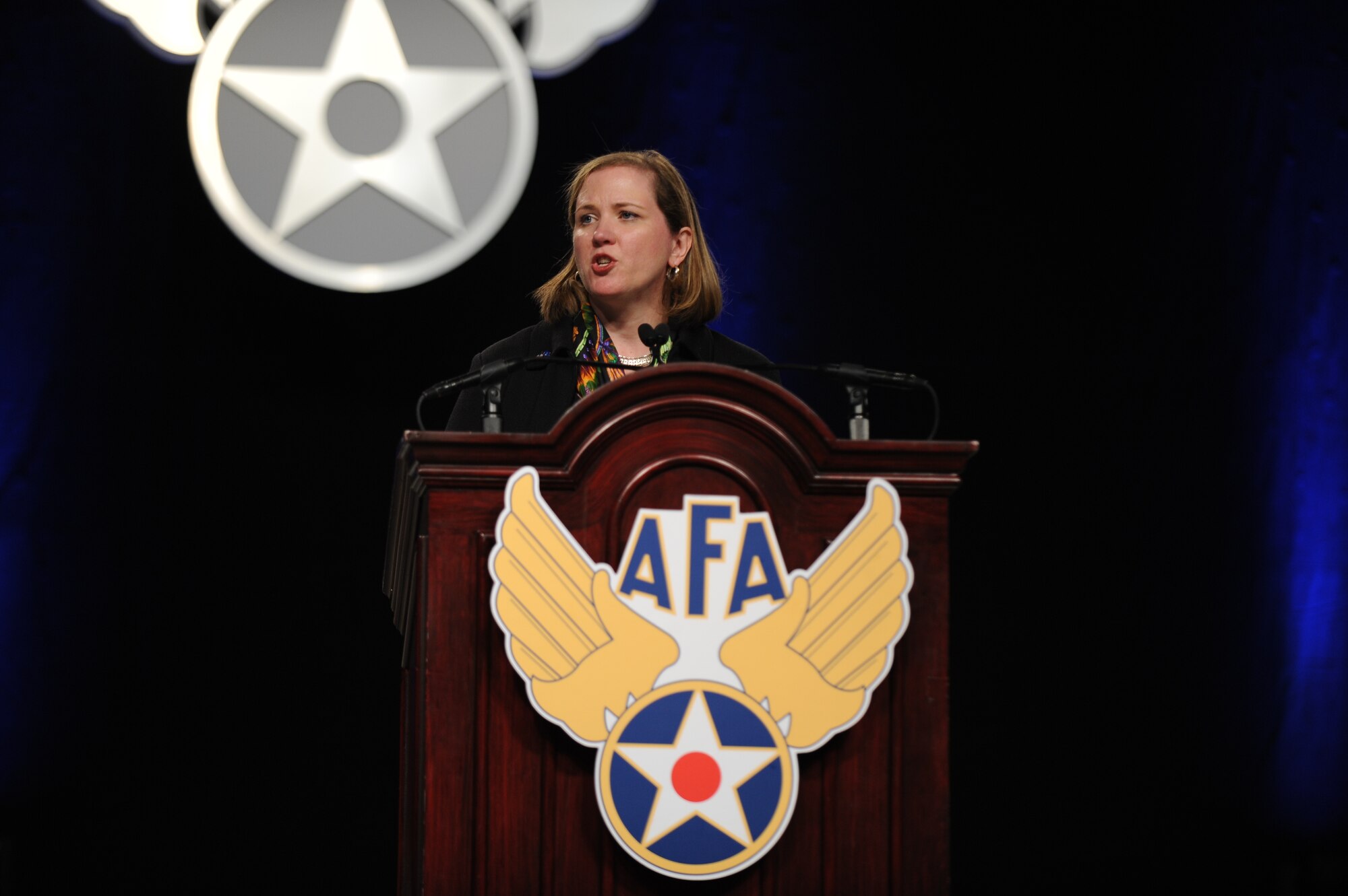 Under Secretary of the Air Force Erin Conaton addresses Airmen, interagency partners and industry leaders Sept. 20, 2011, about strategic opportunities and the need for innovation in the current fiscal environment during the Air Force Association's 2011 Air & Space Conference and Technology Exposition at National Harbor, Md. (U.S. Air Force photo/Master Sgt. Thomas A. Coney)