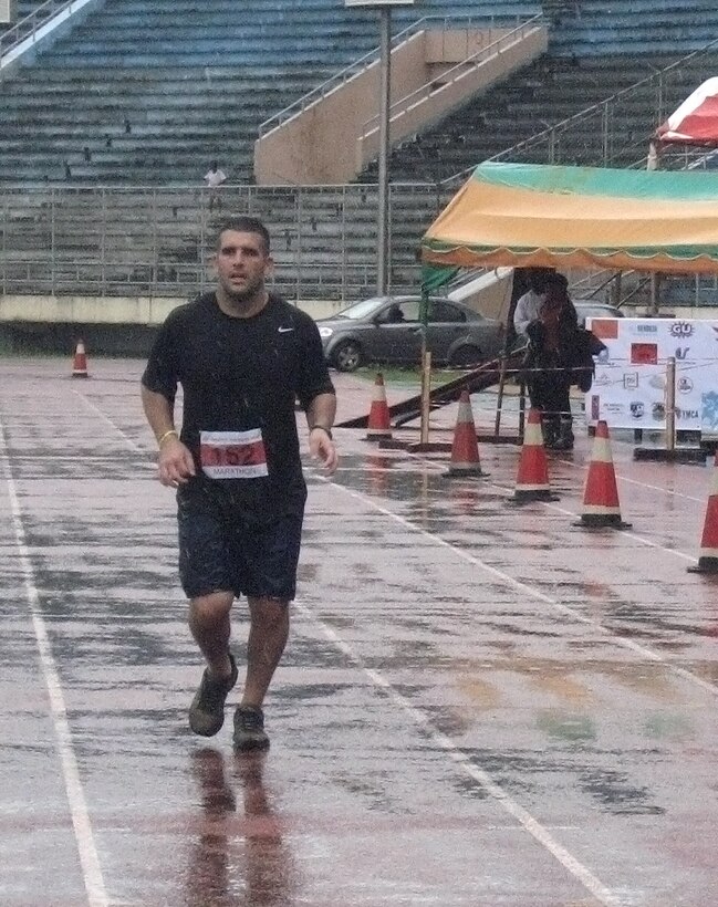 Staff Sgt. Mauricio Pasquale, 633rd Medical Operations Squadron medical technician, finishes the first Liberian Marathon Aug. 28, 2011, with a time of 5 hours, 13 minutes. Pasquale is deployed to West Africa as part of Operation Onward Liberty. (Courtesy photo)