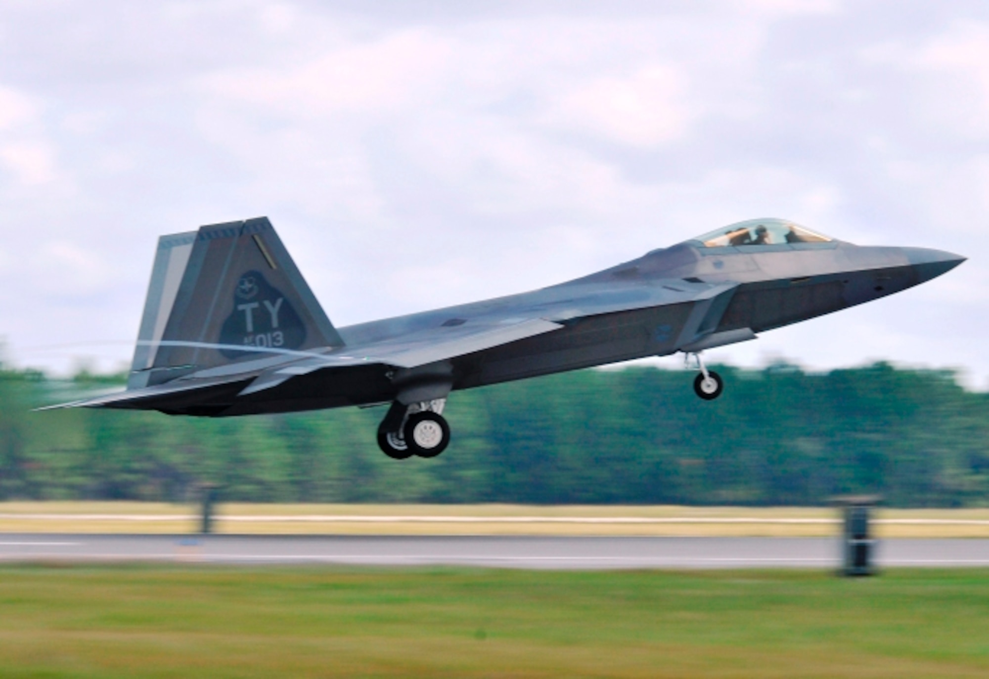 The first of Tyndall's F-22 Raptor fleet takes to the sky today for the first time in nearly four months, after a safety stand-down issue was ordered on the aircraft May 3. (U.S. Air Force photo by Lisa Norman) 