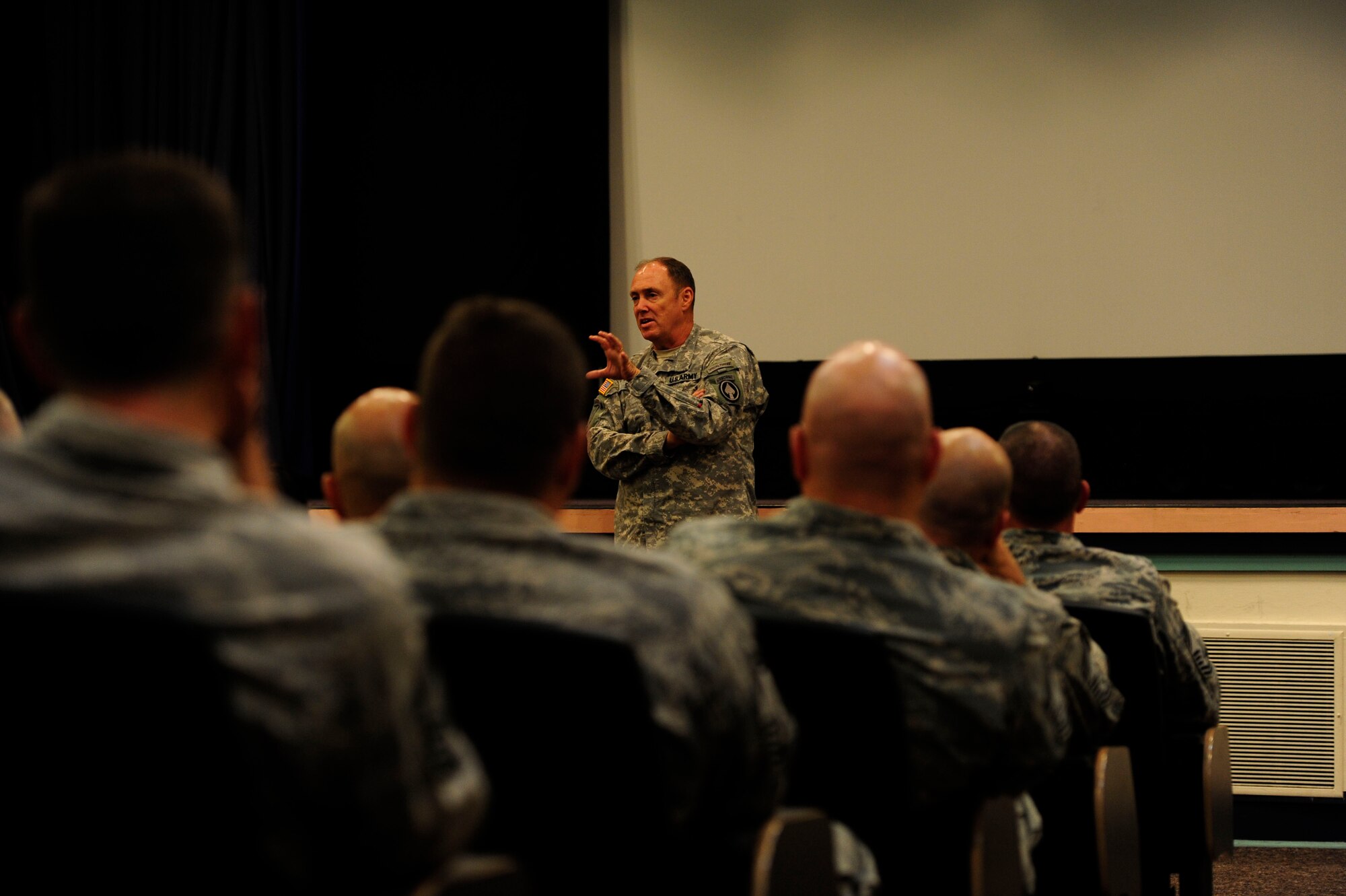Army Command Sgt. Maj. Thomas Smith, senior enlisted adviser of the
U.S. Special Operations Command, speaks to senior enlisted Airmen at the
Commando Auditorium at Hurlburt Field, Fla., Sept.15, 2011. Smith briefed
the audience about the pressures facing the special operations community, as
well as the technological changes he has witnessed over the course of his
nearly 35-year military career. (U.S. Air Force photo/Airman Naomi
Griego)
