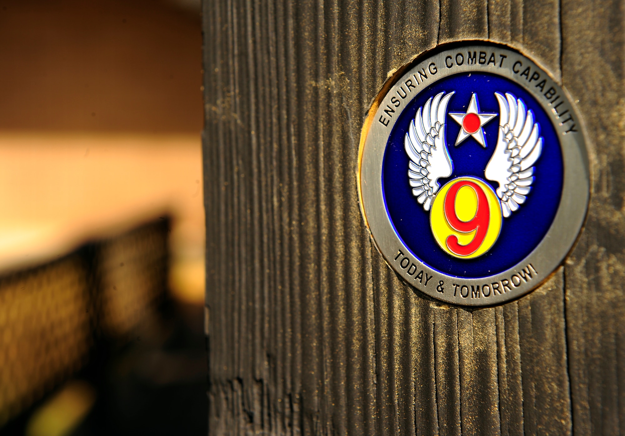U.S. Air Force Maj. Gen. Stephen Hoog, 9th Air Force commander, left his mark by leaving his coin in the post shown on Shaw Air Force Base, S.C. Sept. 19, 2011. Hoog took a tour around Shaw to see and thank team members of the base for their hard work and dedication.  (U.S. Air Force photo/Airman 1st Class Neil D. Warner) (Released)