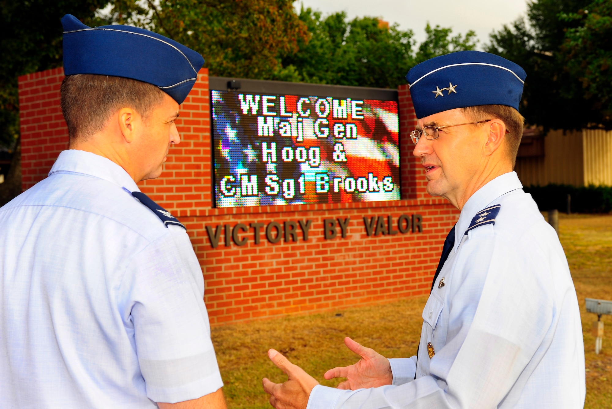 U.S. Air Force Maj. Gen. Stephen Hoog, 9th Air Force commander and Col. Charles Moore, 20th Fighter Wing commander, talk about the new marquee sign near the flightline outside of base operations on Shaw Air Force Base, S.C. Sept. 19, 2011. Hoog took a tour around Shaw to see and thank team members of the base for their hard work and dedication.  (U.S. Air Force photo/Airman 1st Class Neil D. Warner) (Released)