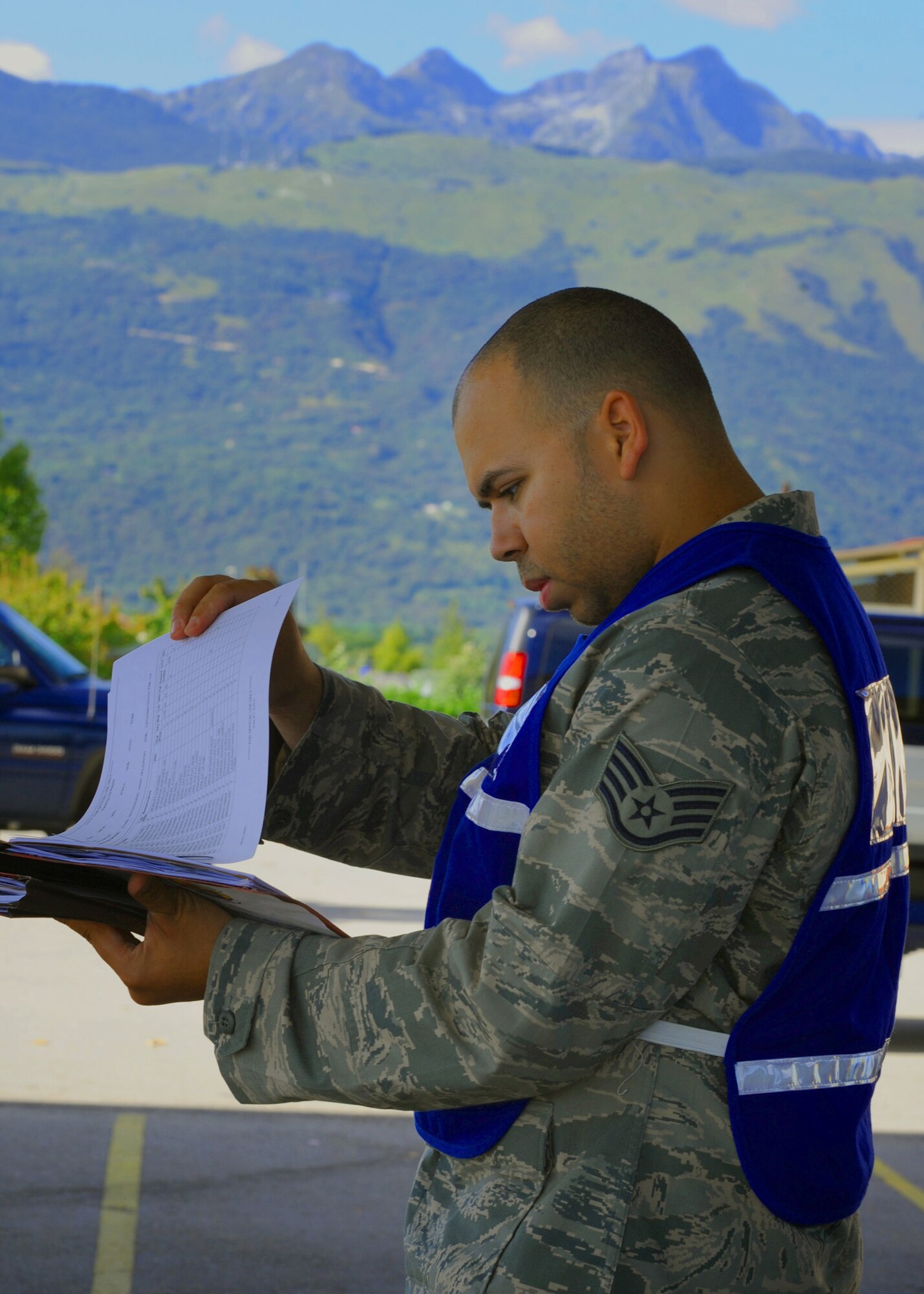 Staff Sgt. Robert Lee, 31st Civil Engineer Squadron emergency management journeyman, and increment monitor reviews paperwork for incoming cargo as part of the operational readiness exercise Sept. 20 at Aviano Air Base, Italy. As a cargo deployment function team member, Lee is responsible for the in processing and shipping all 31st Fighter Wing cargo requirements. (U.S. Air Force photo/ Staff Sgt. Nadine Y. Barclay)