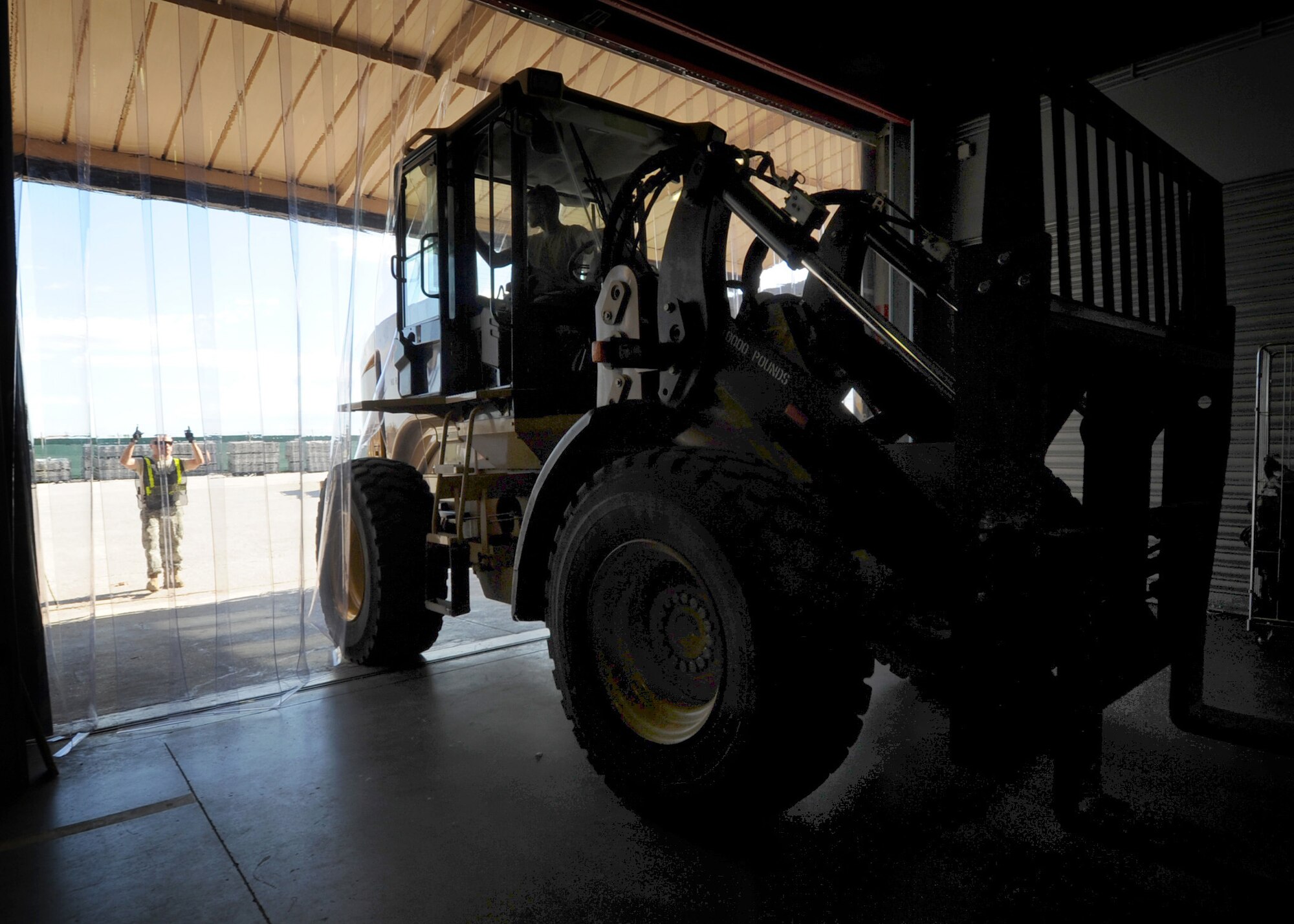 Members of the 31st Logistics Readiness Squadron prepare to move cargo pallets during an operational readiness exercise Sept. 20 at Aviano Air Base, Italy. The cargo deployment function team is responsible for in processing and shipping all 31st Fighter Wing cargo requirements. (U.S. Air Force photo/ Staff Sgt. Nadine Y. Barclay)
