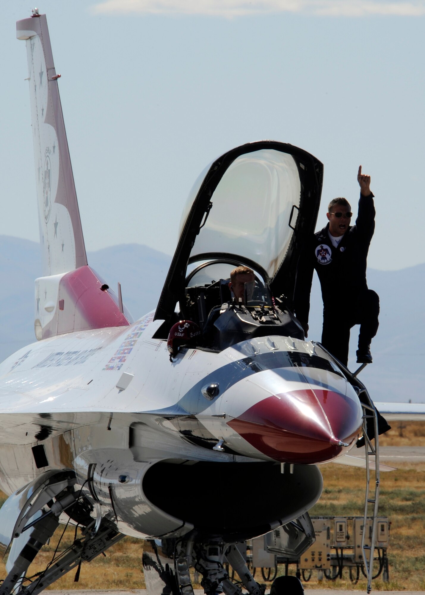 MOUNTAIN HOME AIR FORCE BASE, Idaho – Team one of the U.S. Air Force Thunderbirds performs preflight checks prior to their take off here Sept. 18. The Thunderbirds performed during Gunfighter Skies 2011, which was a two day open house for the public. (U.S. Air Force photo by Senior Airman Angelina Drake) 
