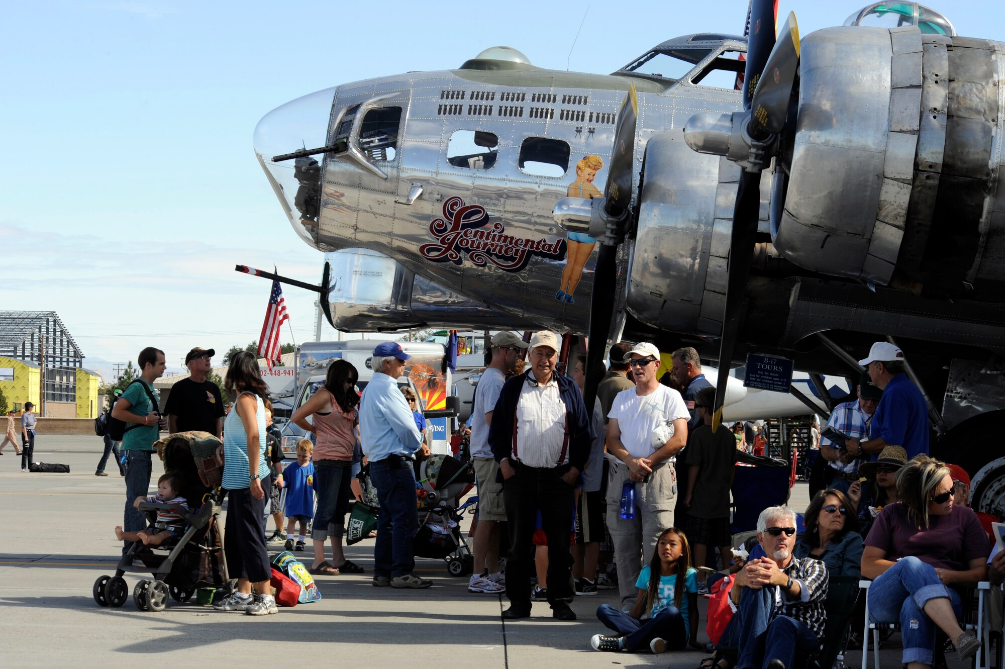 MOUNTAIN HOME AIR FORCE BASE, Idaho – Crowds gather around one of the many historic static displays presented during Gunfighter Skies 2011 here Sept. 18. The B-17 named, Sentimental Journey, offered tours to anyone interested in seeing the inside of the aircraft. (U.S. Air Force photo by Senior Airman Angelina Drake)
