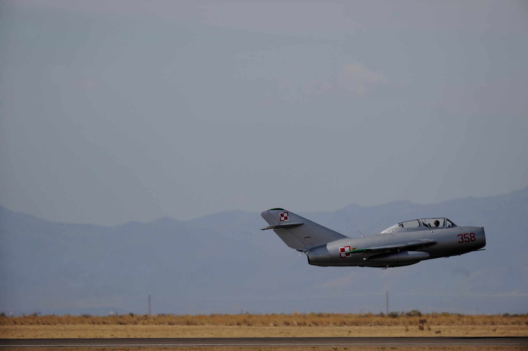 MOUNTAIN HOME AIR FORCE BASE, Idaho – A MiG-17 from the MiG Fury Fighters performs aerial acrobatics during Gunfighter Skies 2011 here Sept. 17. Over 50,000 attendees came to the open house to support Mountain Home Air Force Base and U.S. military members. (U.S. Air Force photo by Staff Sgt. Gina Chiaverotti-Paige)