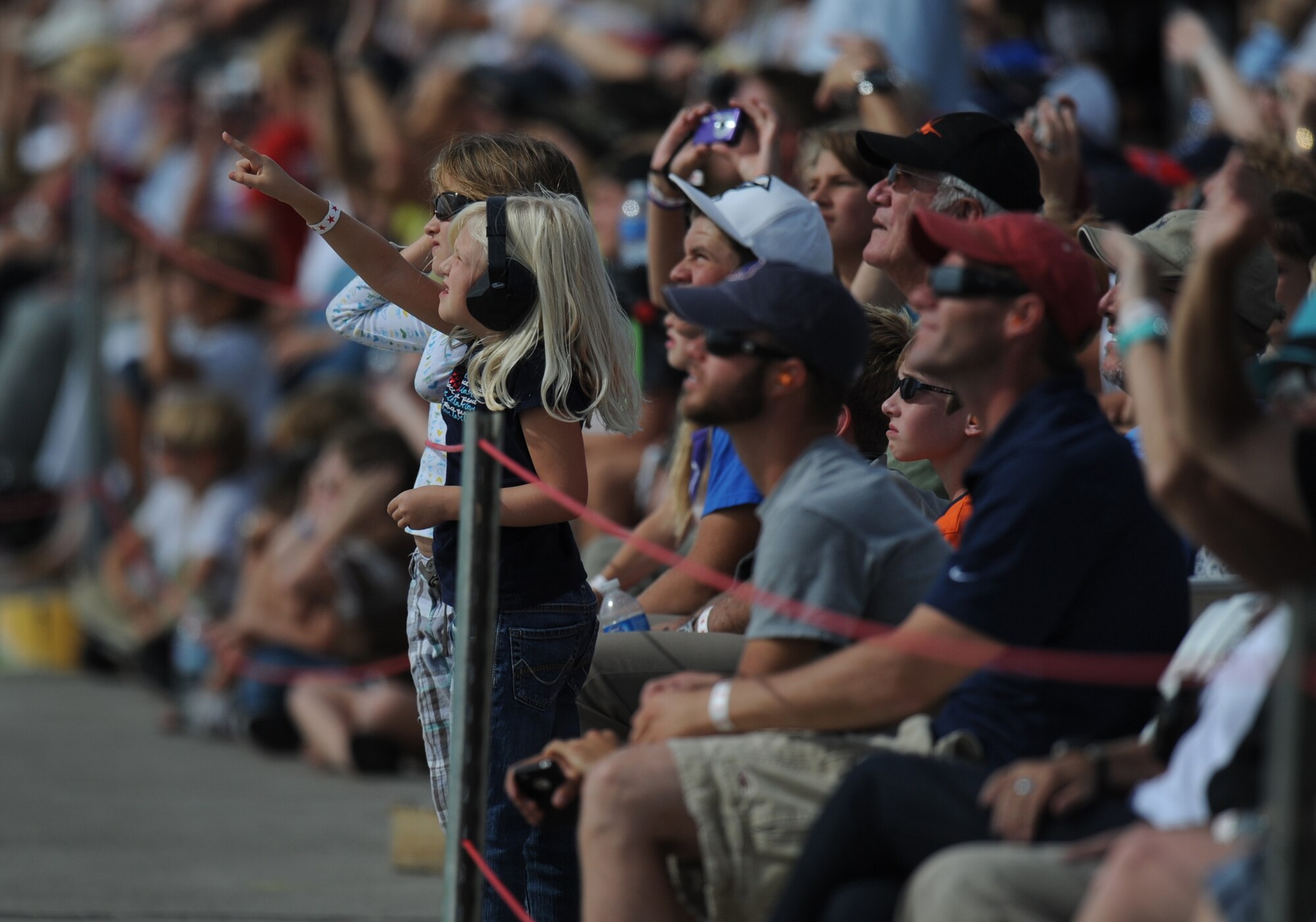 MOUNTAIN HOME AIR FORCE BASE, Idaho – Members of the crowd view aerial demonstrations at Gunfighter Skies 2011 here Sept. 17. The two-day event showcased both military and civilian aerobatic acts. (U.S. Air Force photo by Staff Sgt. Gina Chiaverotti-Paige)