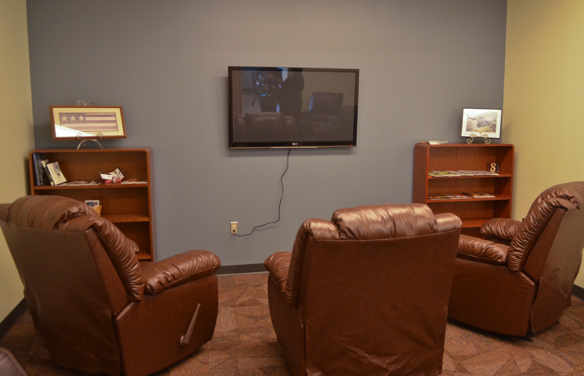The new USO lounge at General Mitchell International airport, Milwaukee has a separate TV viewing area which includes leather recliners 20 September, 2011. The new 800-square-foot  Lounge is now a special place in the airport for all veterans, troops and their families looking for a place to relax during travel or before deployment. (US Air Force photo by SMSgt Jeff Rohloff)