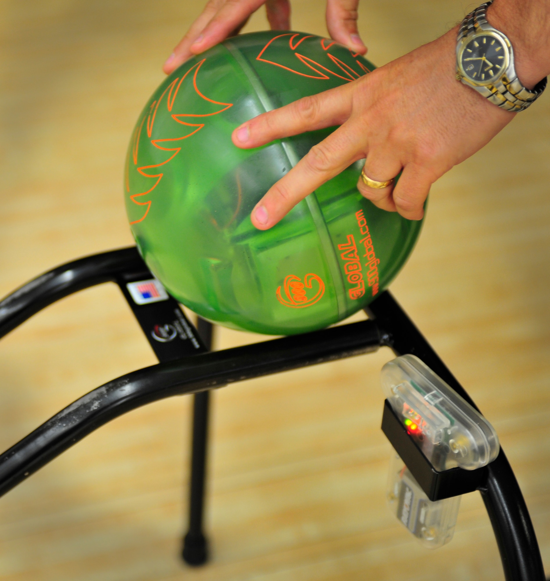 The remote control bowling ball at the bowling center on Shaw Air Force Base, S.C. comes with a remote control with a button that guides the ball to left or right and a ramp to be pushed down. It allows those that are disabled to still experience the joys of bowling. (U.S. Air Force photo/ Airman 1st Class Daniel Phelps/Released)
