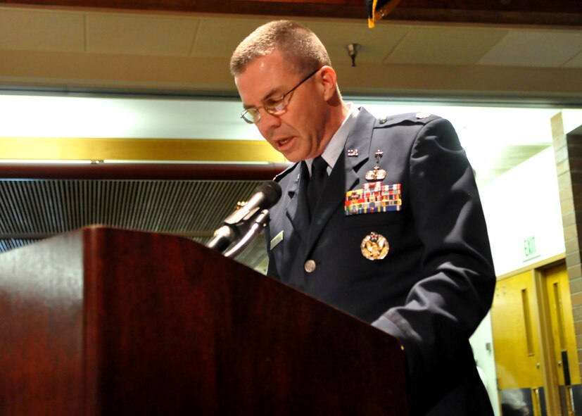 Maj. Matthew Franke, 627th Air Base Group chaplain, delivers the invocation before the start of the Prisoner of War/Missing in Action Recognition Day luncheon at the McChord Field Club Sept. 16, 2011, at Joint Base Lewis-McChord, Wash. (U.S. Air Force photo/Airman 1st Class Leah Young)