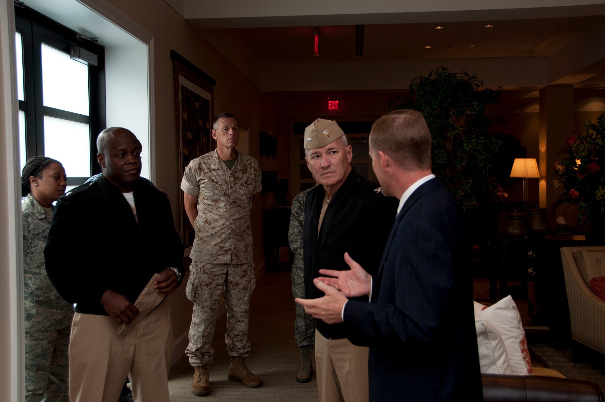 Navy Capt. Murray Gero and Cmdr. Anthony Glover visit Campus for Families of the Fallen at Dover Air Force Base with Mr. Todd Rose, director, Mortuary Affairs Division, Air Force Mortuary Affairs Operations Sept. 20, 2011. Gero is the commander of Navy Casualty and Mortuary Affairs. (U.S. Air Force Photo/Staff Sgt. Agustin Salazar)