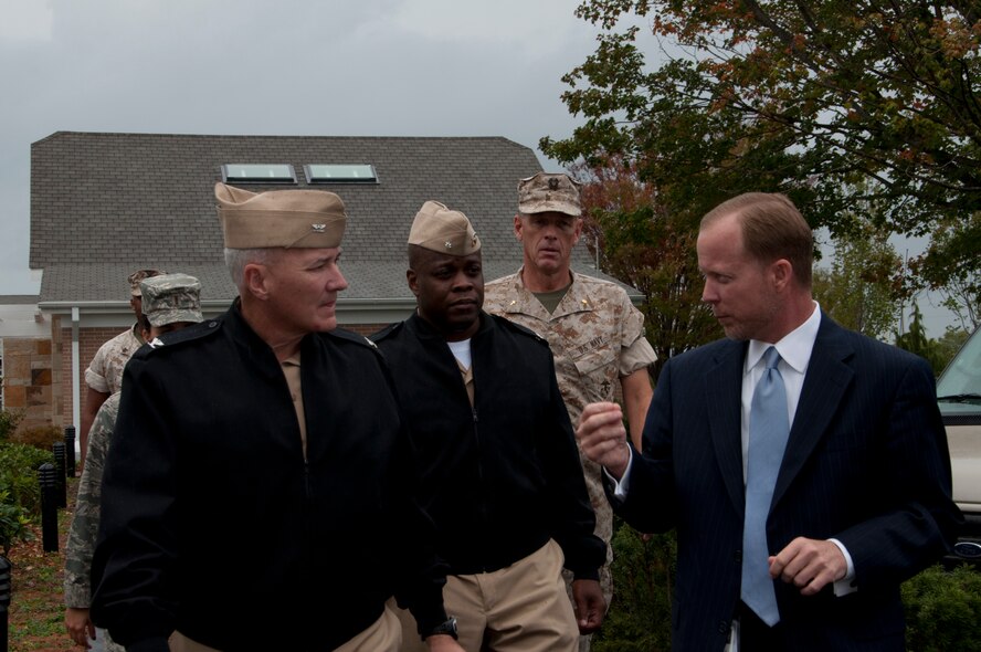 Navy Capt. Murray Gero and Cmdr. Anthony Glover visit Campus for Families of the Fallen at Dover Air Force Base with Mr. Todd Rose, director, Mortuary Affairs Division, Air Force Mortuary Affairs Operations Sept. 20, 2011. Gero is the commander of Navy Casualty and Mortuary Affairs. (U.S. Air Force Photo/Staff Sgt. Agustin Salazar)