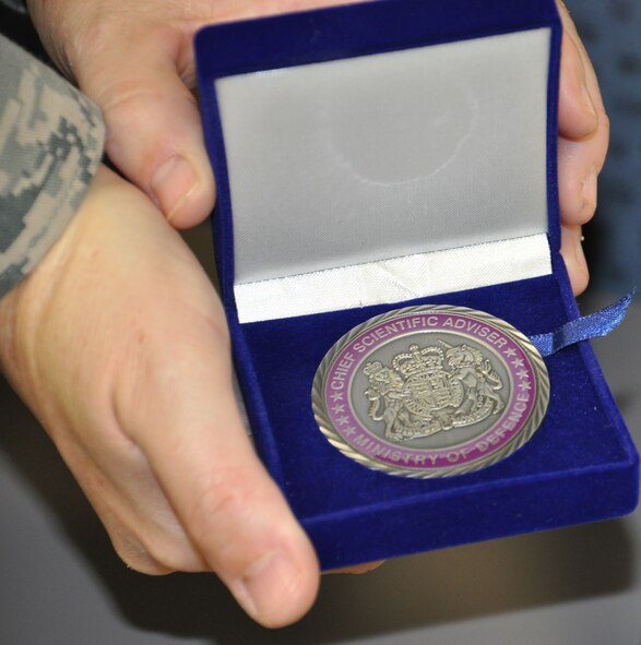 The Special Commendation Medal from the United Kingdom's Defence Science and Technology Laboratory is one of the highest honors bestowed upon Ministry of Defence researchers. (U.S. Air Force photo/Chandra Lloyd) 