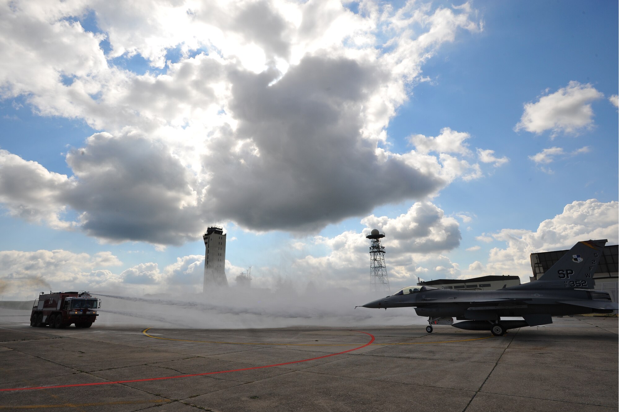 SPANGDAHLEM AIR BASE, Germany – A 52nd Civil Engineer Squadron Fire Department fire truck simulates extinguishing an aircraft fire during a capabilities demonstration for 52nd Fighter Wing leadership here Sept. 19. The demonstration showcased the fire department’s ability to protect Airmen and assets. (U.S Air Force photo/Airman 1st Class Dillon Davis)