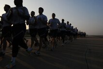 KUNSAN AIR BASE, Republic of Korea -- Members of the Wolf Pack participate in the warrior run here Sept. 16. The warrior run was one event held to remember the prisoners of warrior and missing in action servicemembers because they are never forgotten. (U.S. Air Force photo/Senior Airman Brittany Y. Bateman)
