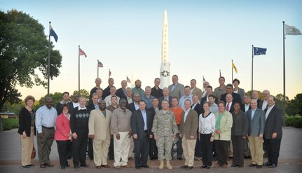 OFFUTT AIR FORCE BASE, Neb. - Maj. Gen. William Grimsley, chief of staff, U.S. Strategic Command, takes a group photo with members of APEX 33, a Department of Defense Senior Executive Service orientation during their visit to USSTRATCOM Sept. 21.  The Apex orientation program provides newly appointed SES&#039; an overview for understanding the structure and processes of various DOD components including combatant commands.  USSTRATCOM was one stop for APEX 33 who&#039;s itinerary also included visits to the Pentagon in Washington, D.C.; Camp Pendleton, Calif.; Nellis AFB, Nev.;  and  U.S. Northern Command at Peterson AFB, Colo. among others.