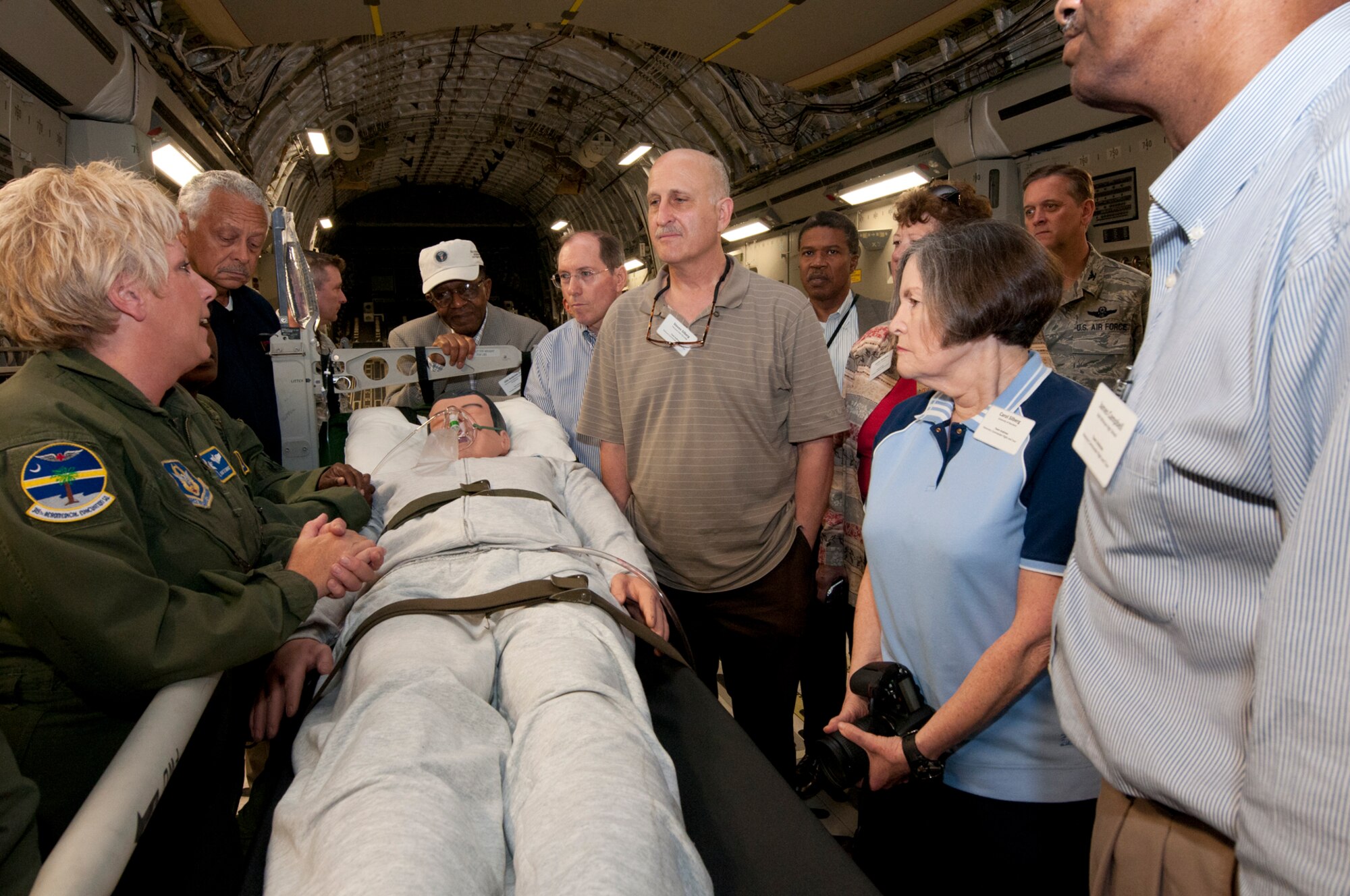 JOINT BASE CHARLESTON, S.C. -- Airmen from the 315th Aeromedical Evacuation Squadron explain to honorary commanders and civic leaders from Joint Base Andrews, Md., how patients are treated aboard a C-17 Globemaster III here Sept. 20. The patient litter display was part of a Civic Leader Tour where honorary commanders and civic leaders learned more about the Total Force mission and networked with senior leaders.The honorary commanders also had the opportunity to tour areas like the 437th Aerial Port Squadron and 437th Aircrew Flight Equipment. (U.S. Air Force photo/Tech. Sgt. Steve Lewis)
