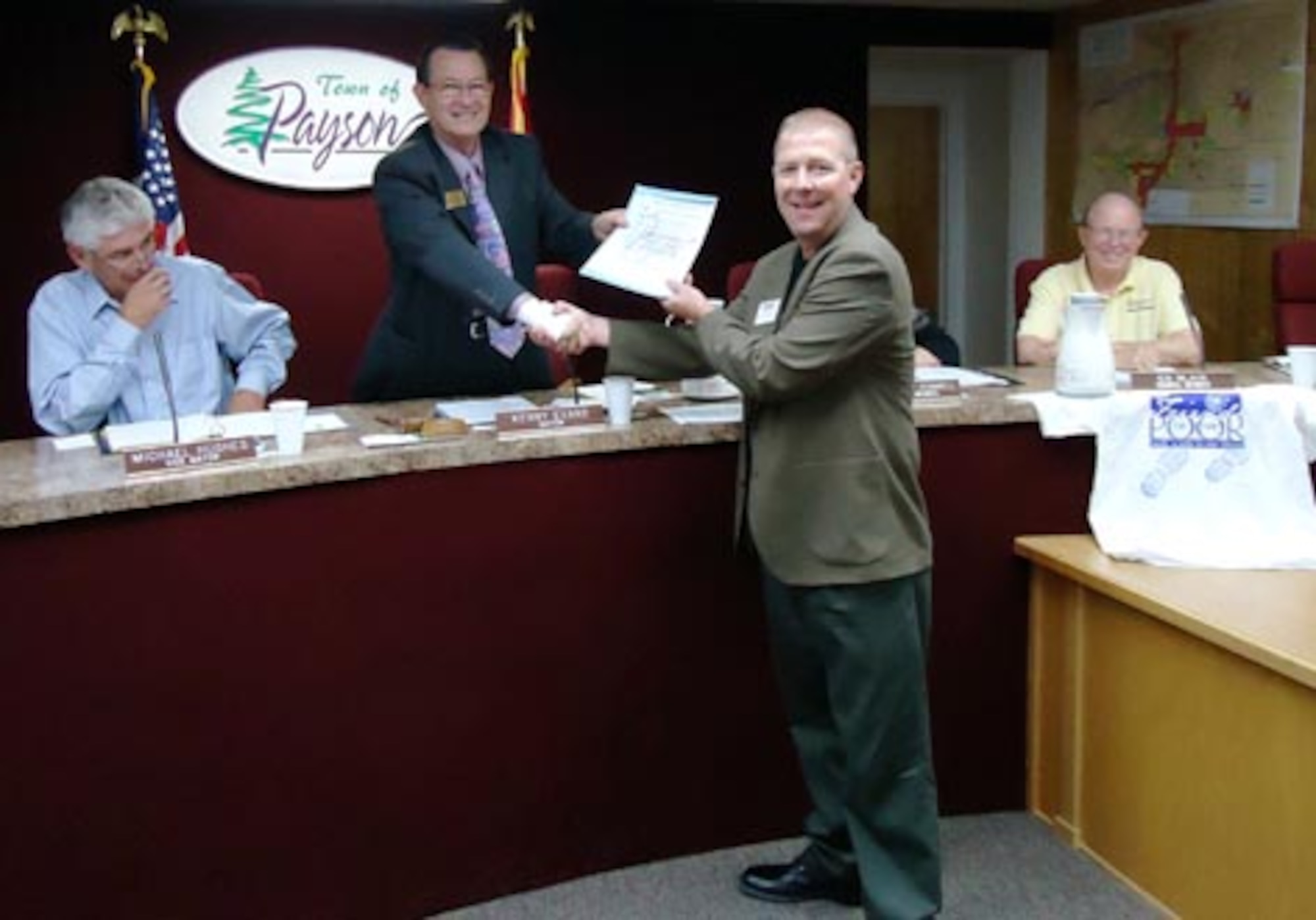 September 8, 2011, Payson, Arizona, Town of Payson, Arizona Mayor Kenny Evans presents Arizona Office for Employer Support of the Guard and Reserve Staff  Member, Butch Wise a Proclamation declaring the week of September 19-23, 2011 as Employer Support of the Guard and Reserve Week.  The Town of Payson has a long history of supporting the Guard and Reserves, and has several Guard and Reserve members who live and serve in the Payson community. (Courtesy photo)


