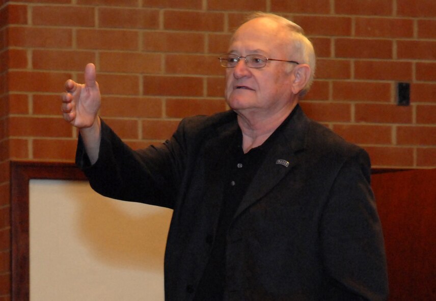 Retired Col. Lawrence "Rocky" Lane, Raven #1, former Air Mobility Command security forces director and founder of AMC's Phoenix Raven course, talks with class 2011D of the Phoenix Raven Training Course in the U.S. Air Force Expeditionary Center's Grace Peterson Hall at Joint Base McGuire-Dix-Lakehurst, N.J., on Sept. 22, 2011. Lane was the guest speaker for the graduation of the 2,000th Raven. (U.S. Air Force photo/Tech. Sgt. Paul R. Evans)