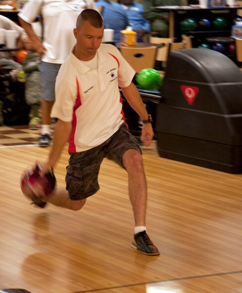 LAUGHLIN AIR FORCE BASE, Texas – Master Sgt. Nick Kurpier, 47th Security Forces Squadron first sergeant, sends a bowling ball down lane during the First Sergeants versus Chiefs Bowling Tournament at Laughlin’s Cactus Lanes Bowling Center Sept. 22. The competition consisted of three matches adding up total pinfalls, ending in a 1,912 to 1,704 victory for the chiefs. (U.S. Air Force photo/Airman 1st Class Nathan L. Maysonet)