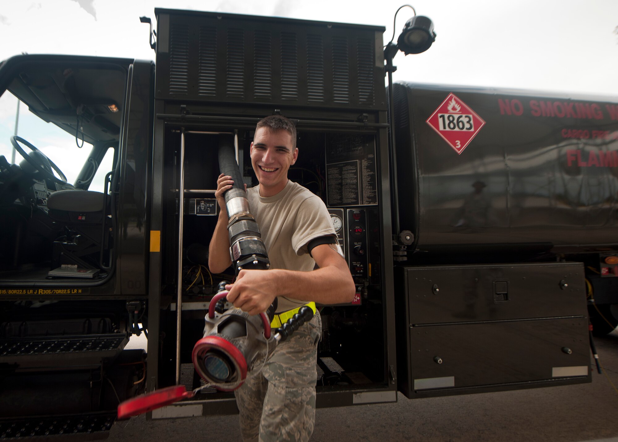 U.S. Air Force Airman 1st Class Kyle Dadswell, 23rd Logistics Readiness Squadron fuels distribution operator, pulls a fuel line from a fuel truck during a no-notice quality assurance inspection at Moody Air Force Base, Ga., Sept. 20, 2011. With the 23rd LRS’s new quality assurance program in place, Dadswell had to display to the quality assurance inspector that he could proficiently perform his day-to-day duties in a safe manner. (U.S. Air Force photo by Airman 1st Class Joshua Green/Released)
