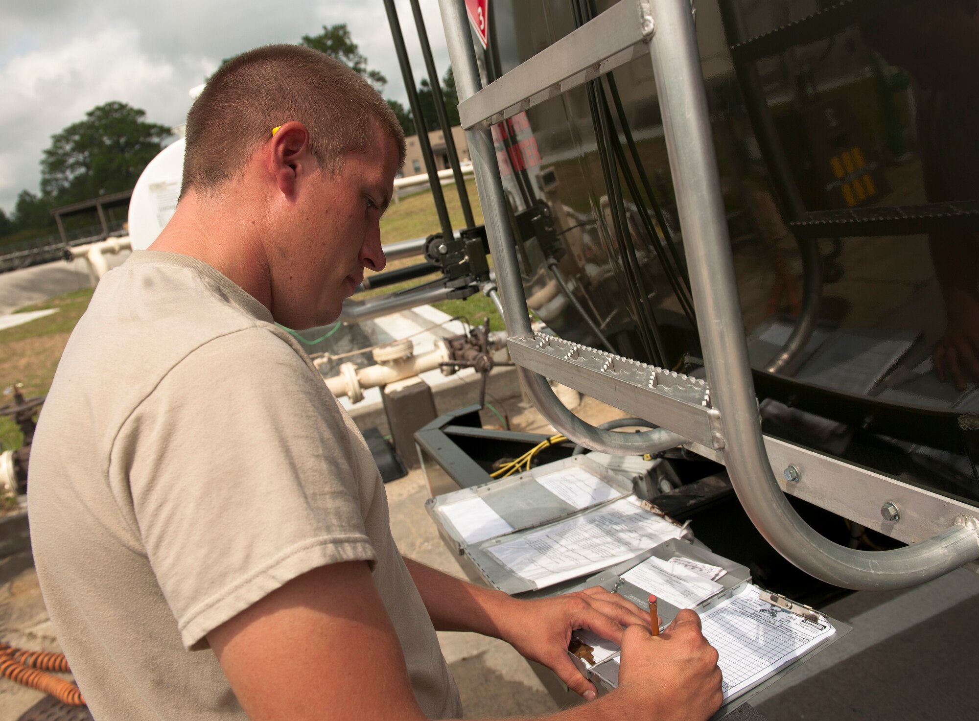 U.S. Air Force Airman 1st Class Justin Wilson, 23rd Logistics Readiness Squadron fuels distribution operator, prepares to refill a fuel truck during a no-notice quality assurance inspection at Moody Air Force Base, Ga., Sept. 20, 2011. Wilson was inspected on his ability to adhere to Air Force Instruction standards and follow his checklist. (U.S. Air Force photo by Airman 1st Class Joshua Green/Released)
