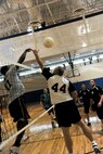 Derico English, 723rd Aircraft Maintenance Squadron, spikes a volleyball over the net during an intramural volleyball championship game at Moody Air Force Base, Ga., Sept. 21, 2011. The play resulted in a score by the 723rd AMXS, which brought the team to within two points of the lead. (U.S. Air Force photo by Airman 1st Class Paul Francis/Released)
