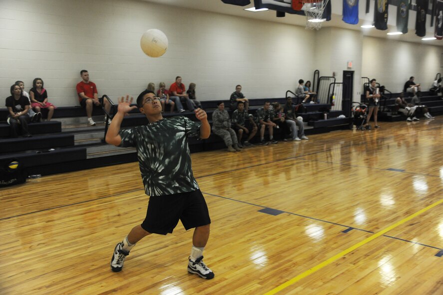 Eugene Quigley, 723rd Aircraft Maintenance Squadron, serves a volleyball during an intramural volleyball championship game at Moody Air Force Base, Ga., Sept. 21, 2011. This was Quigley’s second appearance in the championship game. His team won the tournament in 2008. (U.S. Air Force photo by Airman 1st Class Paul Francis/Released)