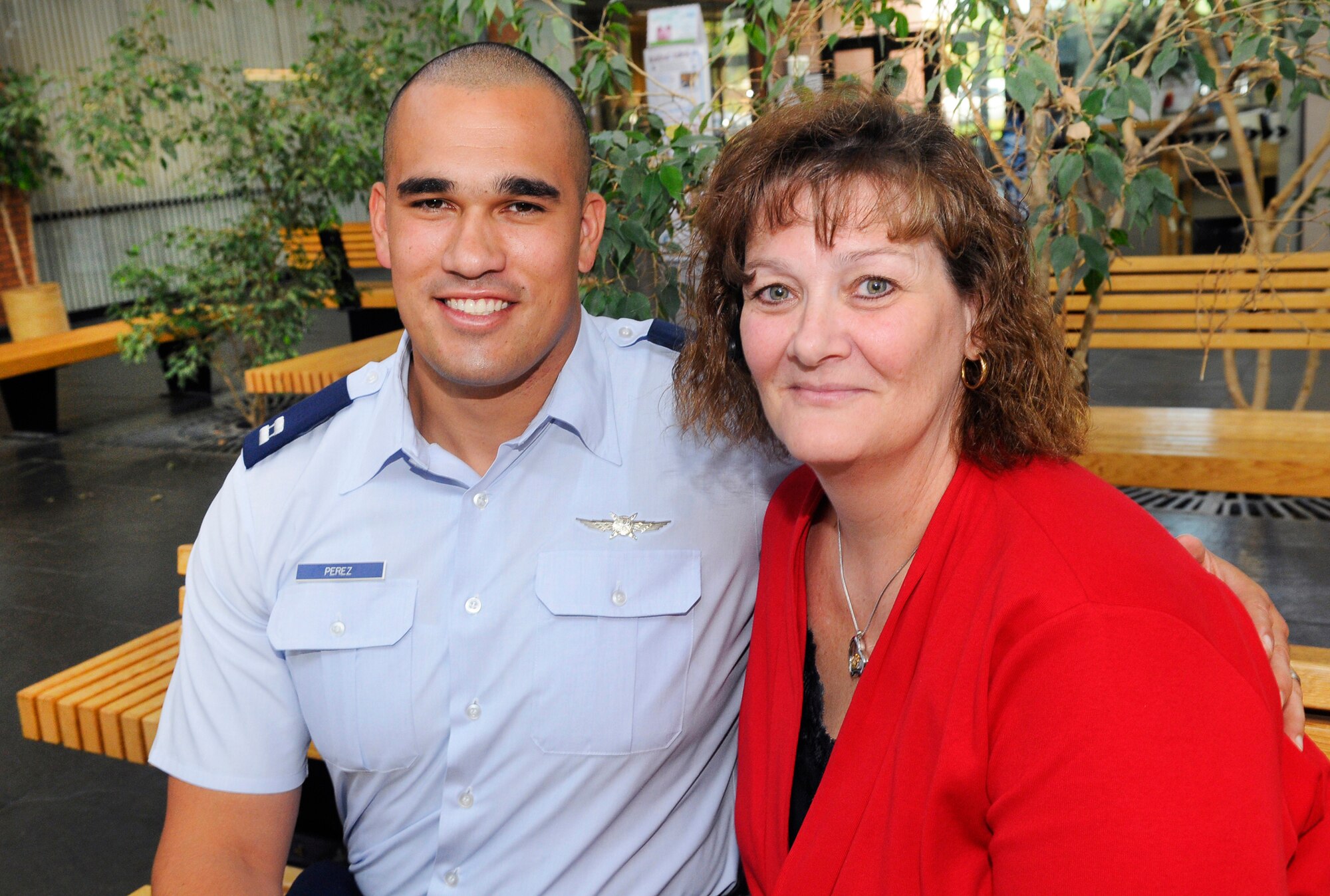 Capt. Gilberto Perez performed the Heimlich maneuver on Patti Williams when he noticed she was in distress while eating a sandwich. U. S. Air Force photo by Sue Sapp