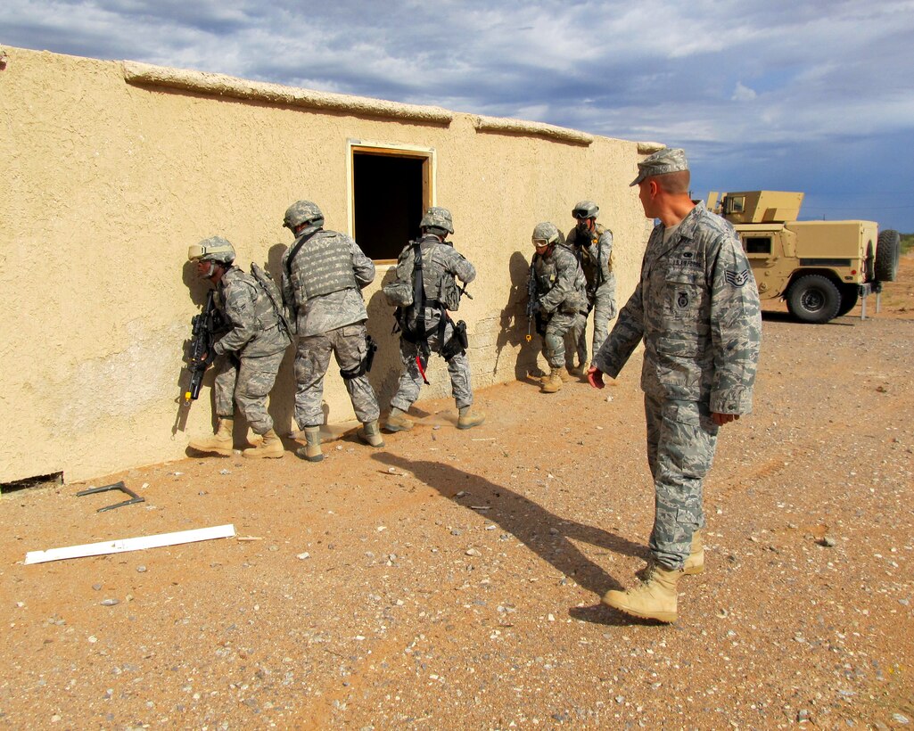 Members of the Texas Air National Guard?s 204th Security Forces Squadron conduct training operations at Fort Bliss, Texas; Sept. 13, 2011. (Air National Guard photo by Staff Sgt. Phil Fountain/Released)      