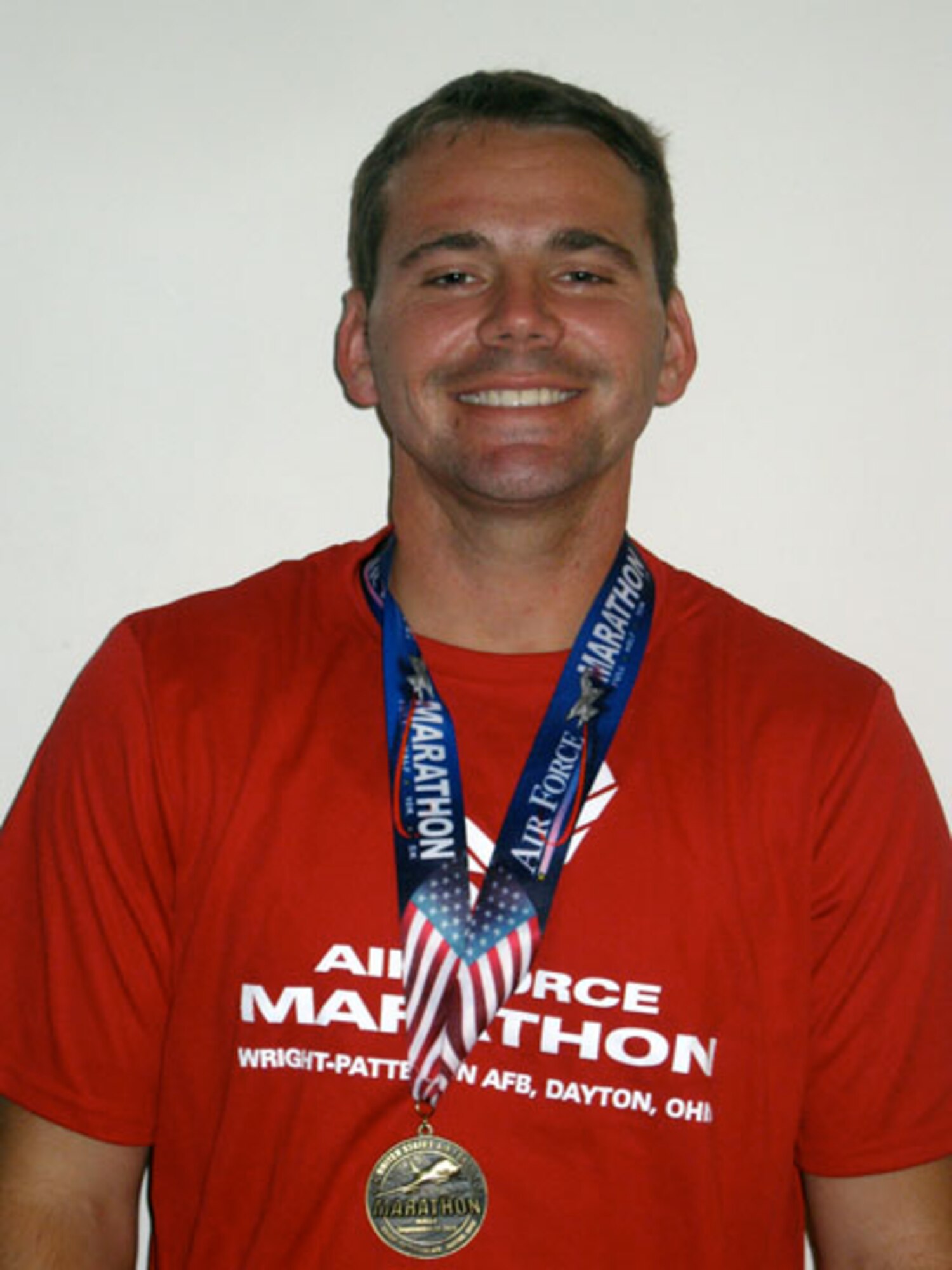 Air Force reservist Staff Sgt. Steve Sobieraj poses for a photo after completing the Air Force Half Marathon Sept. 17, 2011 at Wright-Patterson Air Force Base, Ohio.  Sobieraj is a member of the 452nd Security Forces Squadron at March Air Reserve Base, Calif. (Courtesy photo)