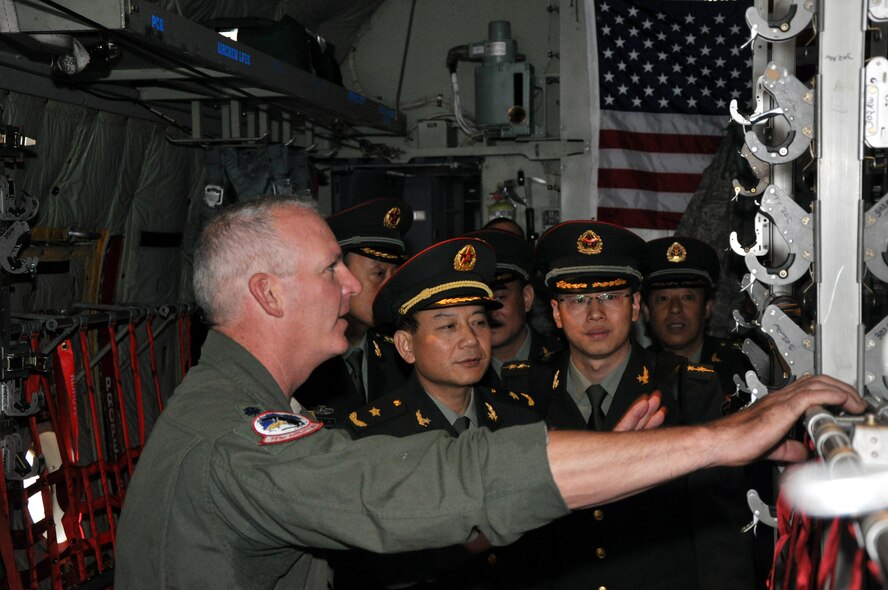 Lt. Col. William Graham (left) a C-130 navigator from the 302nd Airlift Wing's 731st Airlift Squadron answers a question about the Reserve wing's Modular Airborne Firefighting System mission from Maj. Gen. Tang, Fen the Director of Mass Work Office of the General Political Department, People's Liberation Army. The general along with a delegation from the PLA visited the 302nd Airlift Wing to learn about the Air Force Reserve MAFFS mission. The 302nd was one of many stops for the Chinese delegation during their U.S. Northern Command sponsored, three-day visit to the U.S. which was intended to enhance U.S. and Chinese dialogue, and foster relations on humanitarian assistance and disaster operations. (U.S. Air Force photo/Tech. Sgt. Peter Dean)