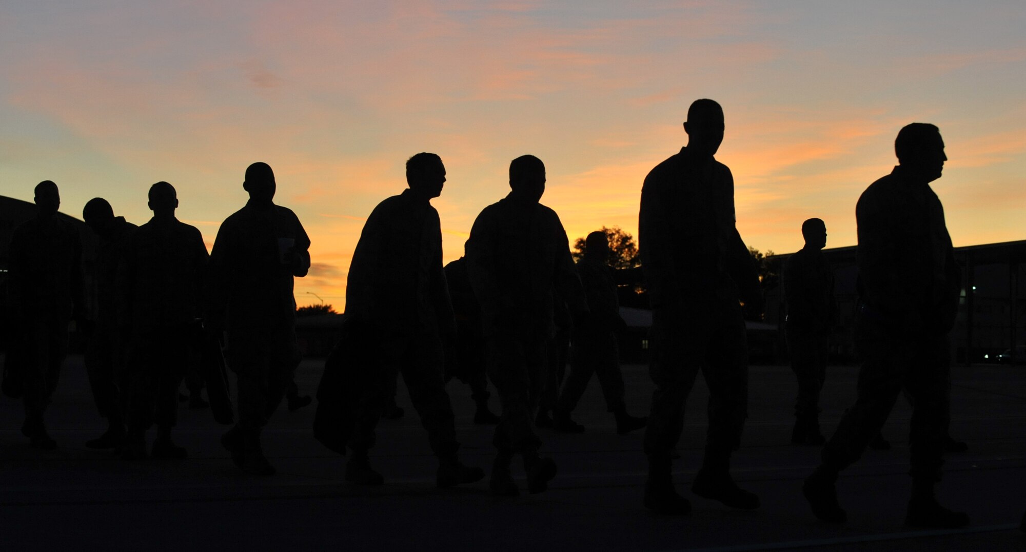 Gunfighters participate in a foreign object debris walk Sept. 19, 2011 at Mountain Home Air Force Base, Idaho. The FOD walk was conducted to ensure any debris left from the Gunfighter Skies 2011 open house was removed from the flightline. (U.S. Air Force photo by Airman 1st Class Heather Hayward)
