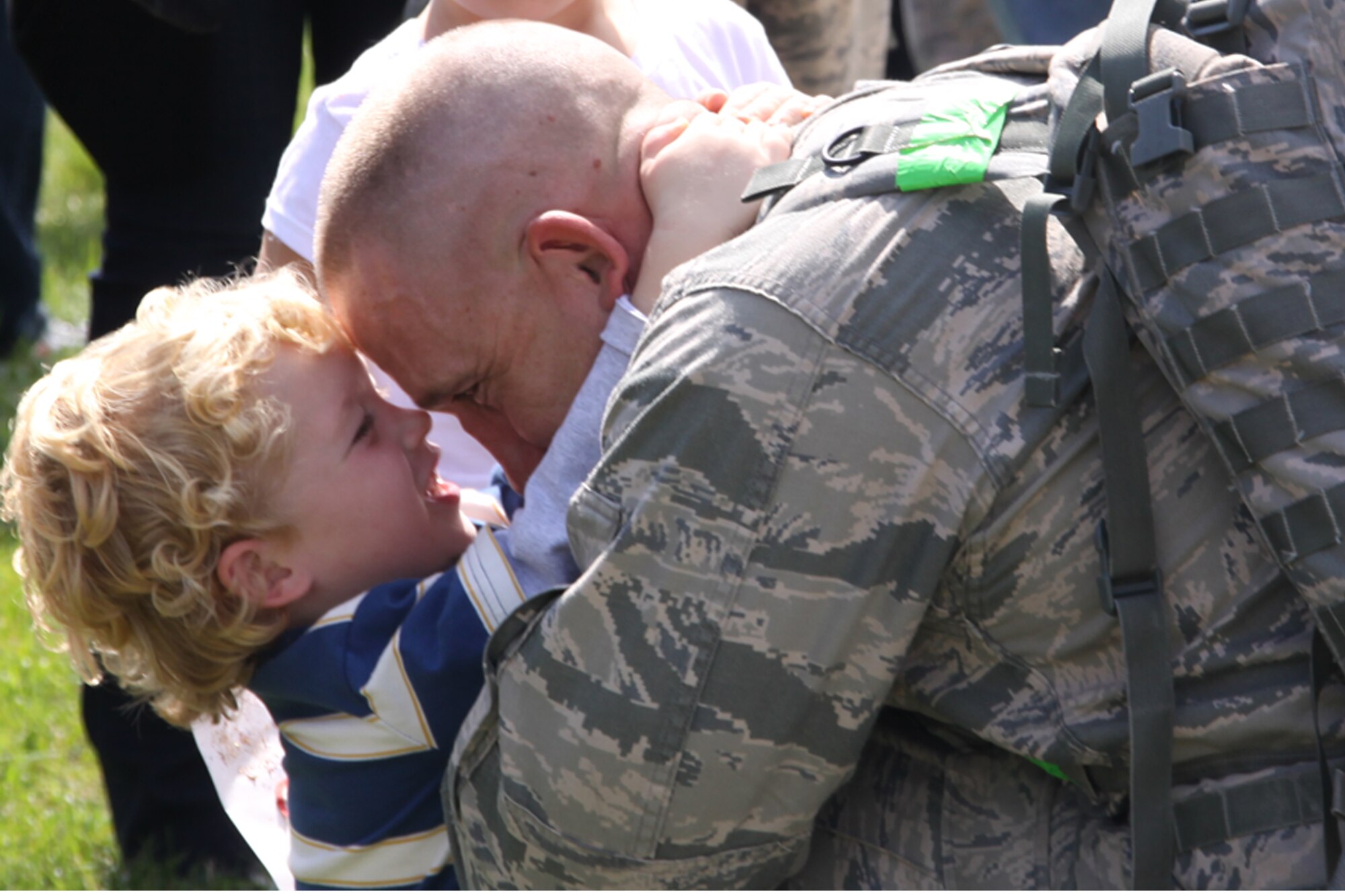 PITTSBURGH IAP ARS-- Tech. Sgt. Joshua Rush, 911th Security Forces Squadron, is greeted by his child upon his return from a six-month deployment to Afghanistan, Sept. 21. (U.S Air Force/Senior Airman Jonathan Hehnly)