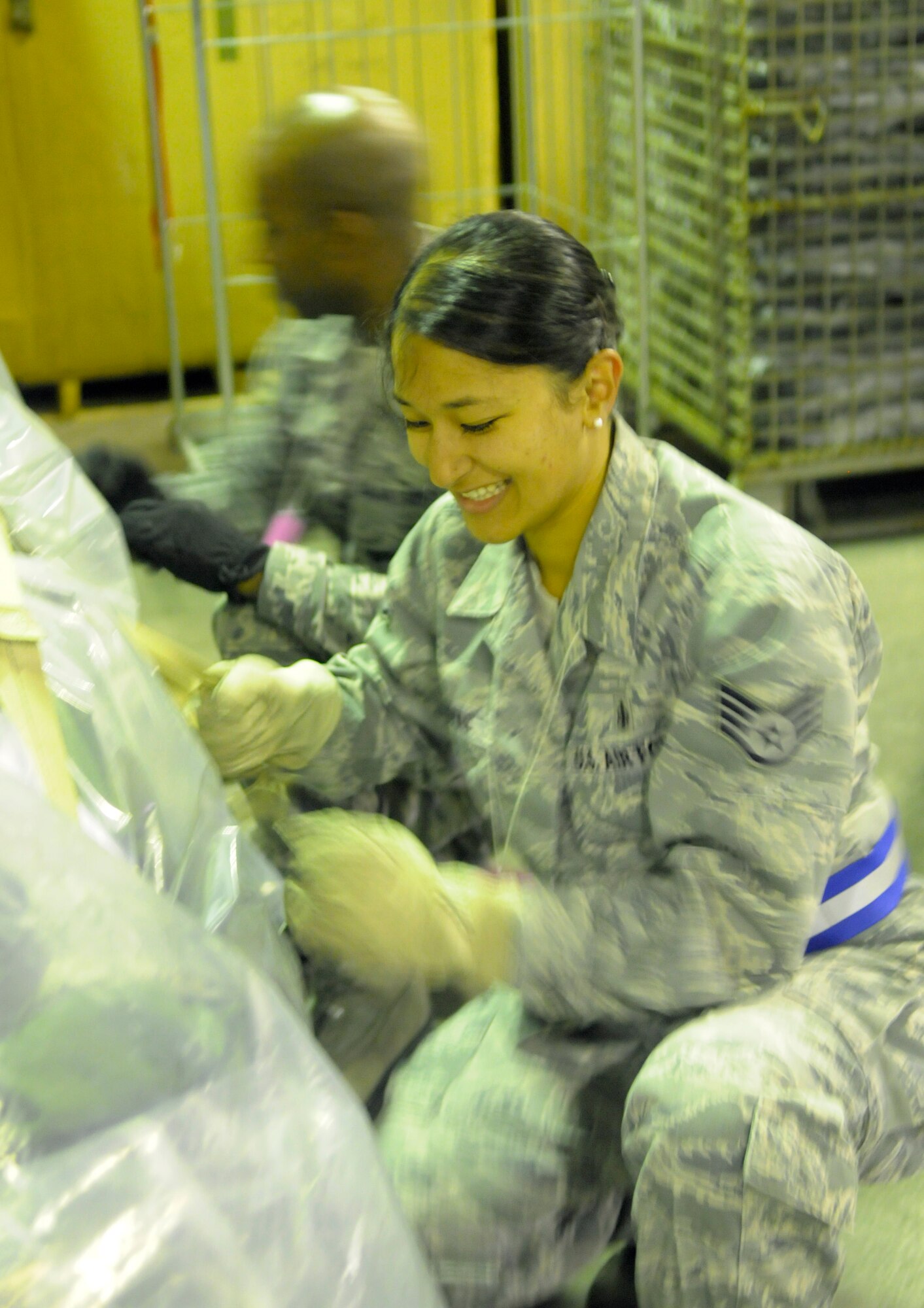 Staff. Sgt Kimberly Duenas, 31st Dental Squadron dental lab technician, processes a cargo shipment as part of an operational readiness exercise Sept. 21 at Aviano Air Base, Italy. Duenas is part of the ORE's cargo deployment function team  (U.S. Air Force photo/Airman 1st Class Briana Jones)