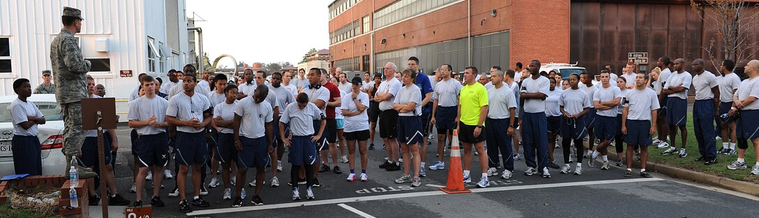U.S. Air Force Col. Kevin Auch, 633rd Air Base Wing commander, encourages the runners before starting the Combined Federal Campaign 5K Run, Langley Air Force Base, Va., Sept. 22, 2011. The CFC is the world’s largest and most successful workplace charity campaign, raising millions of dollars during the campaign season of Sept. 1st through Dec. 15th each year. (U.S. Air Force photo by Airman 1st Class Teresa Cleveland/Released)