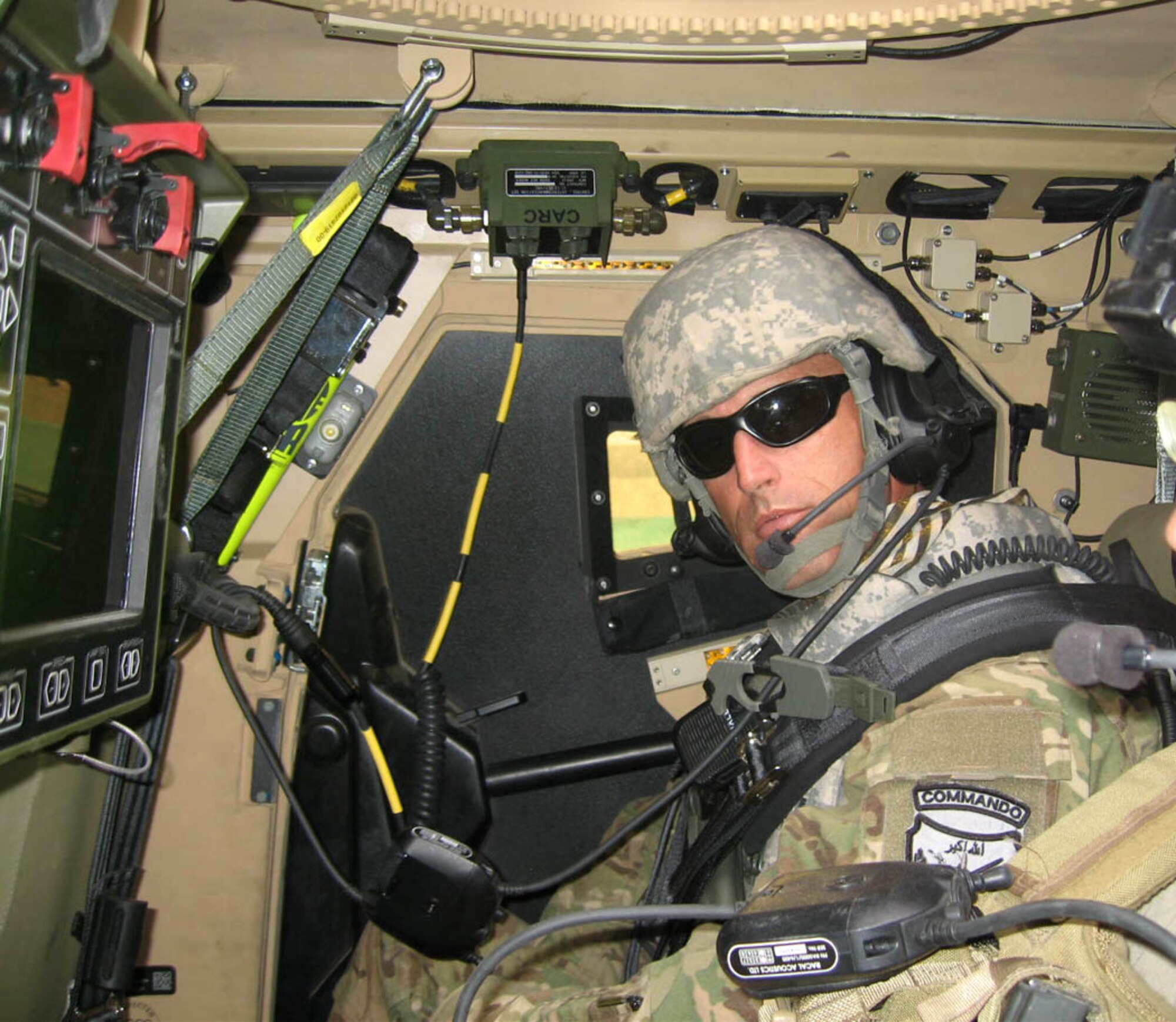 TRAVIS AIR FORCE BASE, Calif. -- Maj. Alan Tornay is locked and loaded, ready to take off to an undisclosed location during his recent deployment. The major was deployed for six months to a forward operating location, embedded with a joint task force that included all branches of the U.S. military, NATO forces, and the Afghan National Army. (Courtesy photo)