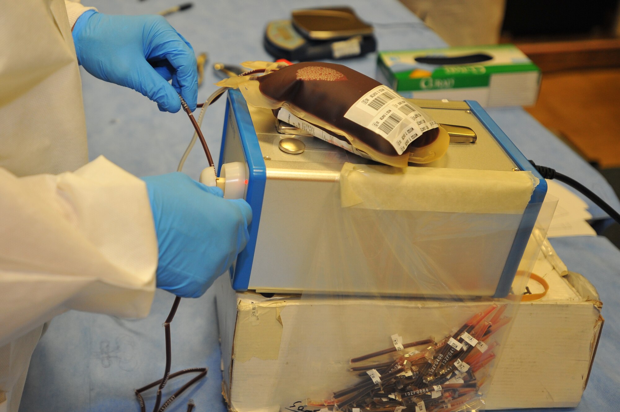 SPANGDAHLEM AIR BASE, Germany – A Landstuhl Regional Medical Center lab technician uses a segging machine to seal blood bags during the Spangdahlem Blood Drive here Sept. 21. The Armed Forces Blood Drive is a worldwide joint operation organized by the Armed Services Blood Program to collect, process, store, distribute and transfuse blood to different locations across the globe. (U.S. Air Force photo/Airman 1st Class Dillon Davis)