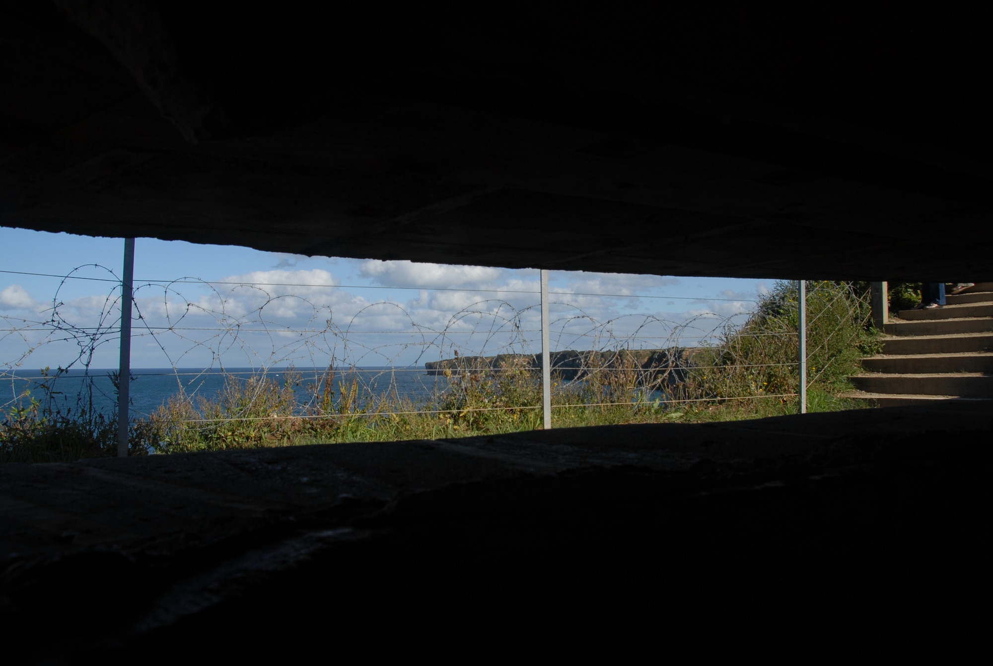 POINTE DU HOC, France -- This is the view Nazi soldiers had from inside this pillbox on D-Day. The 2nd Ranger Battalion climbed sheer, 100-foot cliffs to neutralize the German guns pounding Omaha and Utah Beaches June 6, 1944. Today, the site is a memorial to the Rangers who fought and died there. (U.S. Air Force photo/Senior Master Sgt. Valerie J. Weaver)