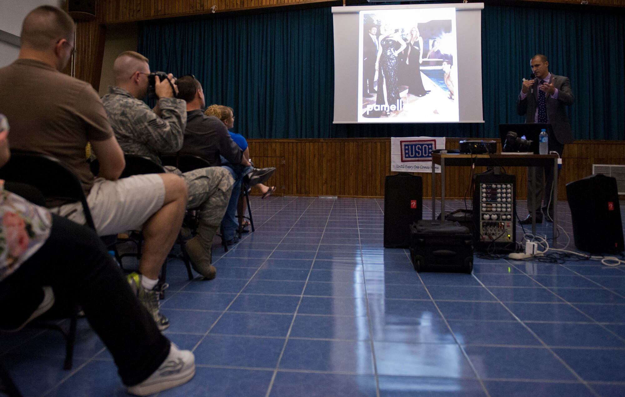 Nigel Barker, internationally renowned photographer, hosts a photography workshop organized by the United Services Organization and the 39th Force Support Squadron Sept. 20, 2011, at Incirlik Air Base, Turkey. Barker discussed photography tips and styles dealing with fashion and marketing with a group of Incirlik’s novice and expert photographers. (U.S. Air Force photo by Senior Airman Anthony Sanchelli/Released)