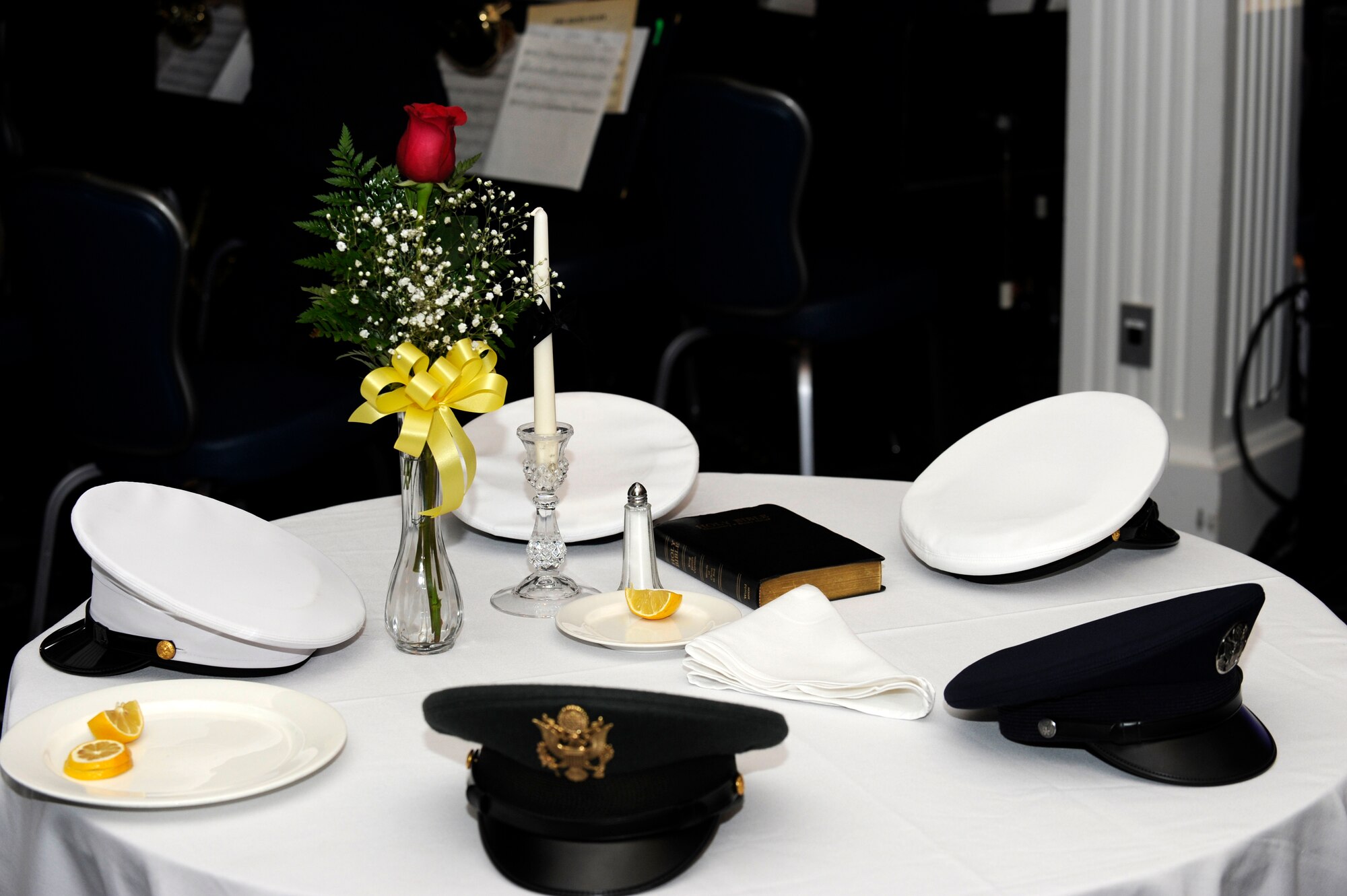 A lone table commemorating missing and fallen comrades sits somberly in the corner during the Air Force Ball celebration Sept. 16, Joint Base Anacostia-Bolling Washington, D.C. Sept. 18 the Air Force celebrated its 64th birthday. Maj. Gen. Darren McDew, Air Force District of Washington commander, paid respects to all comrades, past and present, during the night's closing comments. "You can lay your head down at night with no regrets," he said. "I am proud to know you. Our nation is proud of you and our Air Force needs you." (U.S. Air Force photo by Staff Sgt. Raymond Mills)