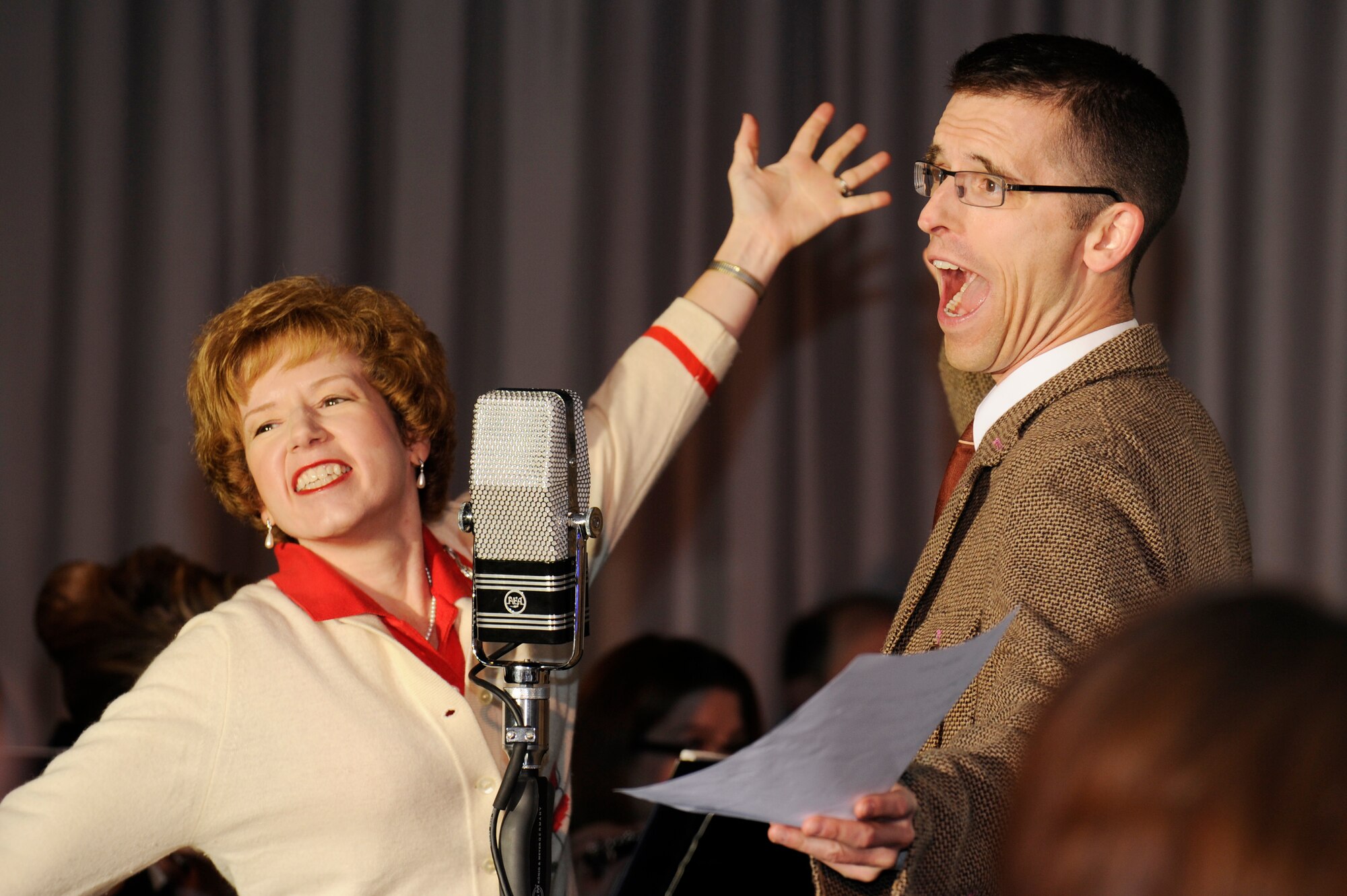 Senior Master Sgts. Linda Waring and Matthew Irish perform a World War II jingle used to encourage military personnel to use their ration card properly. Rationing was commonplace in the war theater as well as the home front. Rationing provisions meant hard times for those back home, but insured fighting men and women had the necessary supplies to continue the war effort, which eventually lead to victory with the signing of surrender documents by the Japanese Imperial Army on the deck of the American battleship USS Missouri on Sept. 2, 1945. (U.S. Air Force photo by Staff Sgt. Raymond Mills)