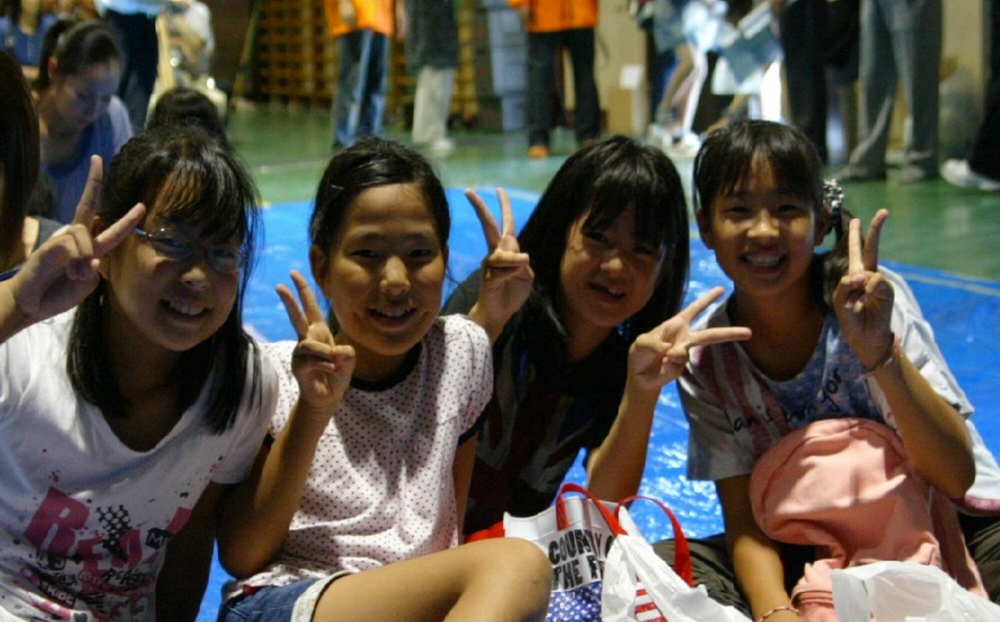 SENDAI, JAPAN--Japanese children say “ sayonara” Sep 2011. Sep 2011 (courtesy photo)
