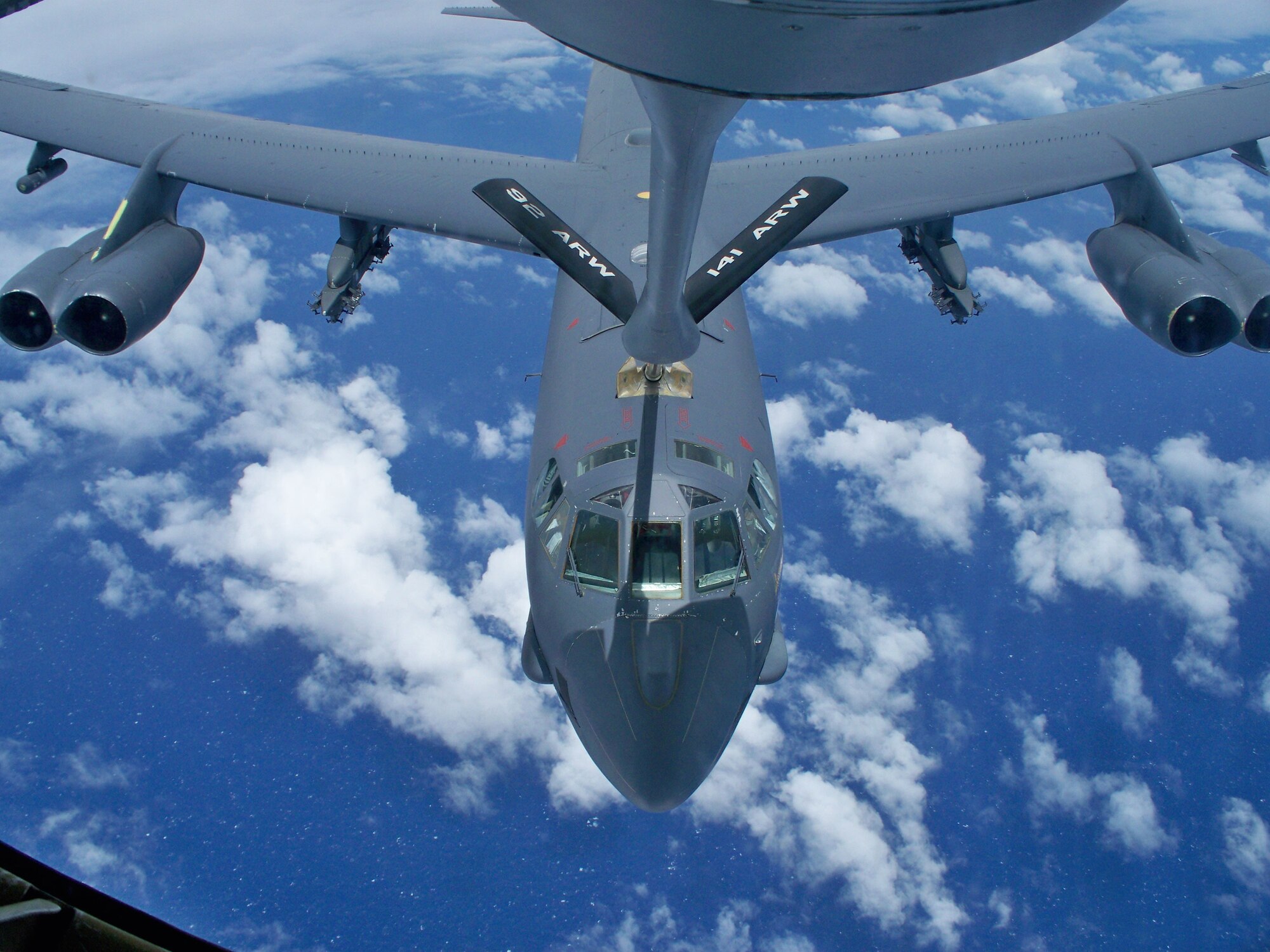 A B-52 Stratofortress from the 20th Expeditionary Bomb Squadron, Barksdale Air Force Base, La., connects with a KC-135 tanker for in-flight refueling during a weapons training mission Aug. 19. Currently deployed to Andersen in support of the continuous bomber presence, the mission to Alaska was the first higher headquarters directed mission of their tour. (U.S. Air Force photo/Capt Aaron Bogart)

