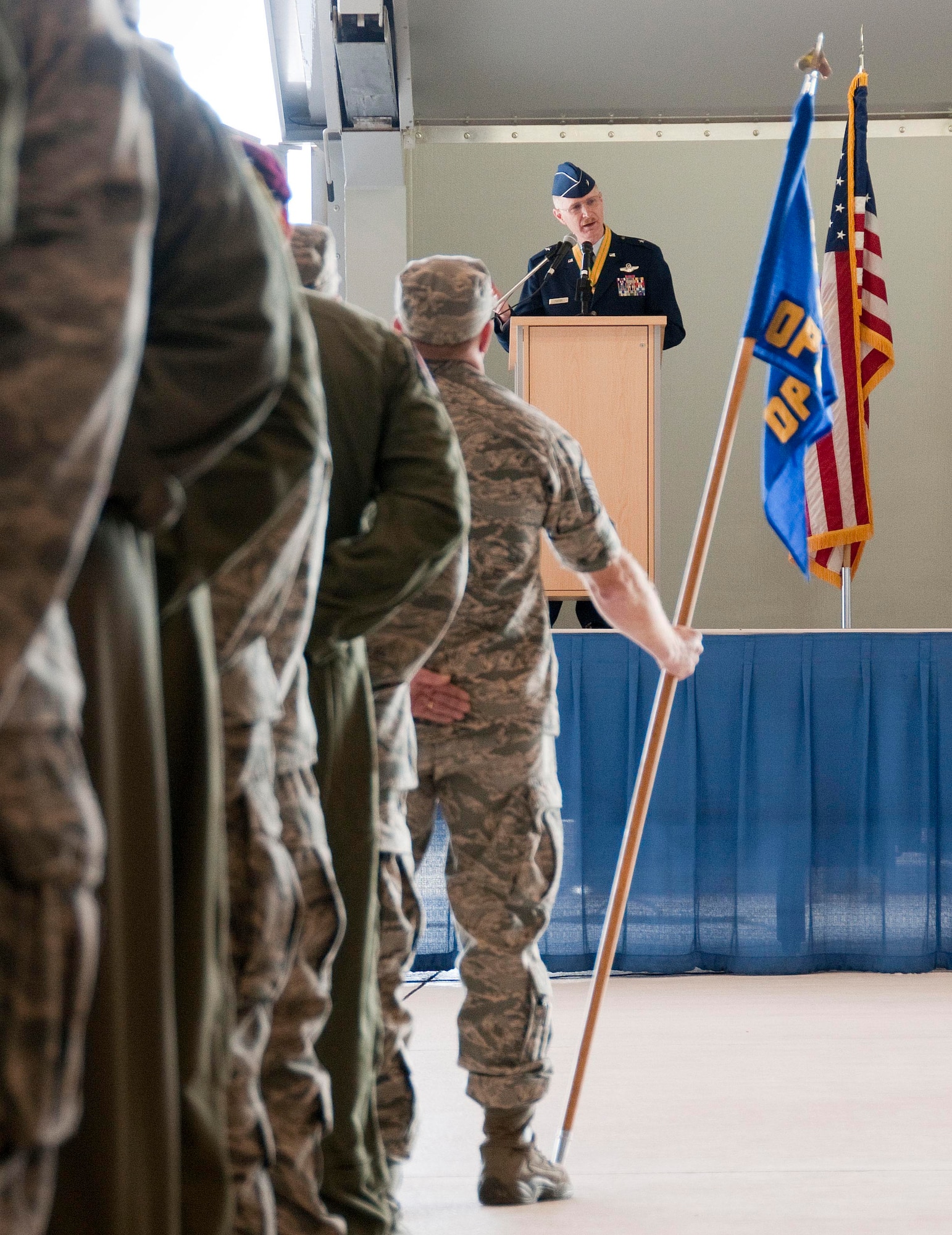 JOINT BASE ELMENDORF-RICHARDSON, Alaska -- Brig. Gen. Charles "Chuck" Foster, outgoing commander of the Alaska Air National Guard's 176th Wing, bids his Airmen fairwell at the wing's change-of-command ceremony here Sept. 18, 2011. Col. Donald S. Wenke assumed command of the wing from Foster, who had led the organization since 2008. Alaska Air National Guard photo by Capt. John Callahan.