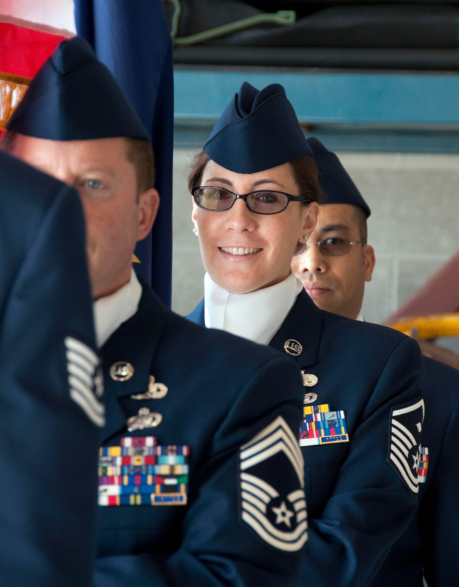 JOINT BASE ELMENDORF-RICHARDSON, Alaska -- Master Sgt. Janet Lemmons, the First Sergeant for the 176th Civil Engineer Squadron and a member of the 176th Wing's Color Guard, awaits the start of the wing's change-of-command ceremony here Sept. 18, 2011. Col. Donald S. Wenke assumed command of the wing from Brig. Gen. Charles "Chuck" Foster, who had led the organization since 2008. Alaska Air National Guard photo by Capt. John Callahan.