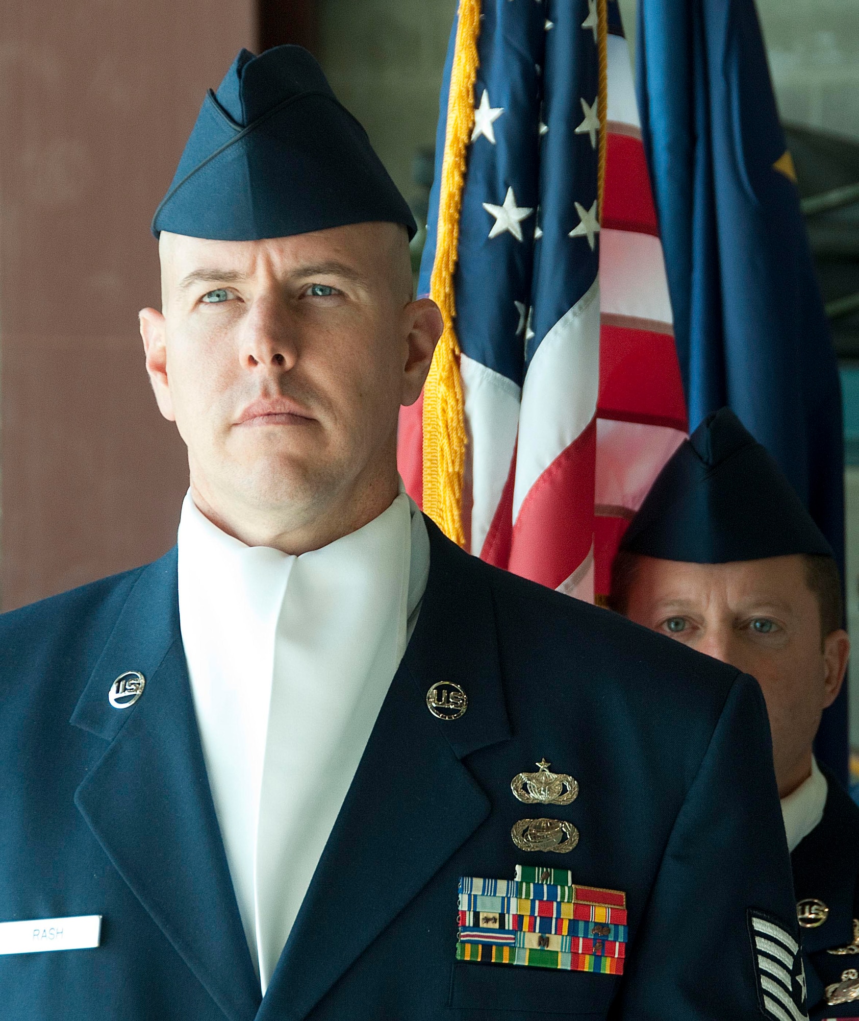 JOINT BASE ELMENDORF-RICHARDSON, Alaska -- Tech Sgt. James A. Rash, a personnel specialist with the 176th Force Support Flight, leads the Color Guard here Sept. 18, 2011. Col. Donald S. Wenke assumed command of the 176th Wing from Brig. Gen. Charles "Chuck" Foster, who had led the wing since 2008. Alaska Air National Guard photo by Capt. John Callahan.