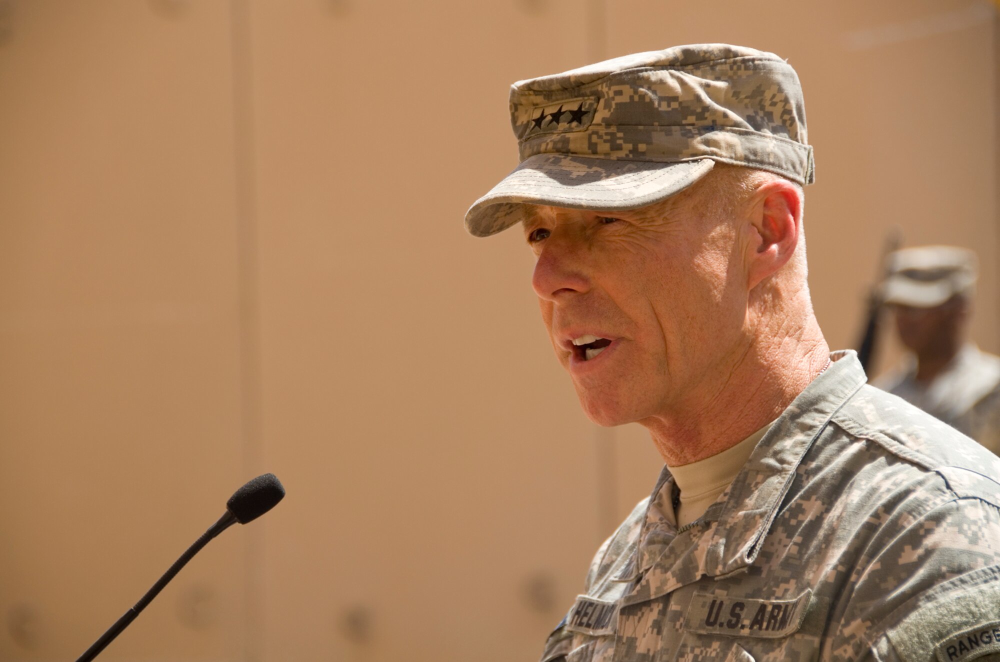 Army Lt. Gen. Frank Helmick, Deputy Commanding General for Operations, United States Forces - Iraq, speaks at the 9/11 Remembrance Ceremony on Al Asad Air Base, Iraq Sept. 11, 2011. The ceremony remembers the terrorists attacks on Sept. 11, 2001. (U.S. AIr Force photo/Staff Sgt. Shawn Rose)