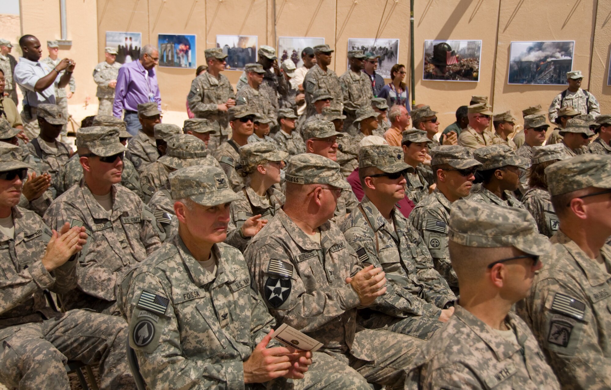 Service members and civilians attend the 9/11 Remembrance Ceremony on Al Asad Air Base, Iraq Sept. 11, 2011. The ceremony remembers the terrorists attacks on Sept. 11, 2001. (U.S. AIr Force photo/Staff Sgt. Shawn Rose)